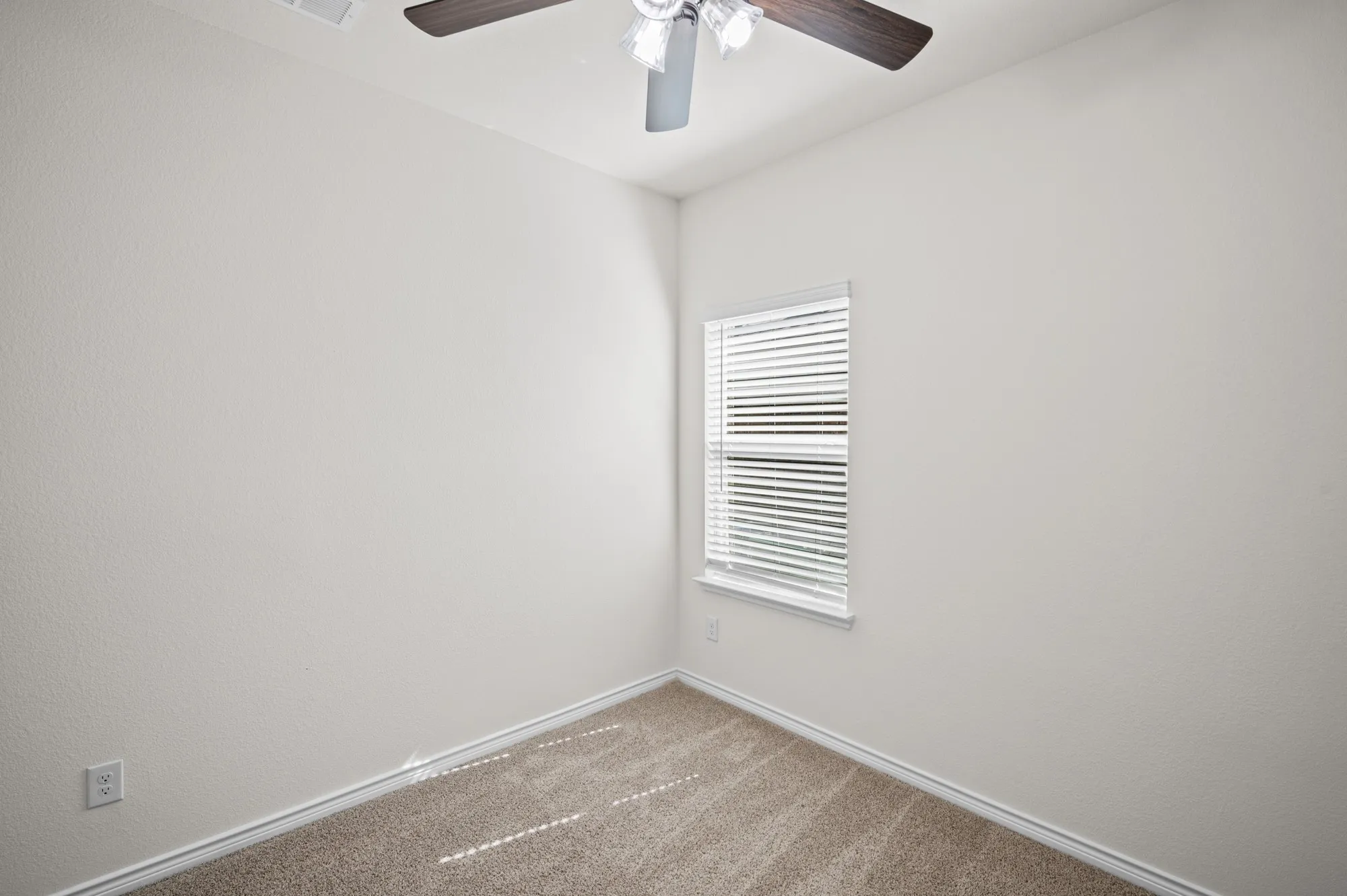 Neutral-toned walls with textured finish