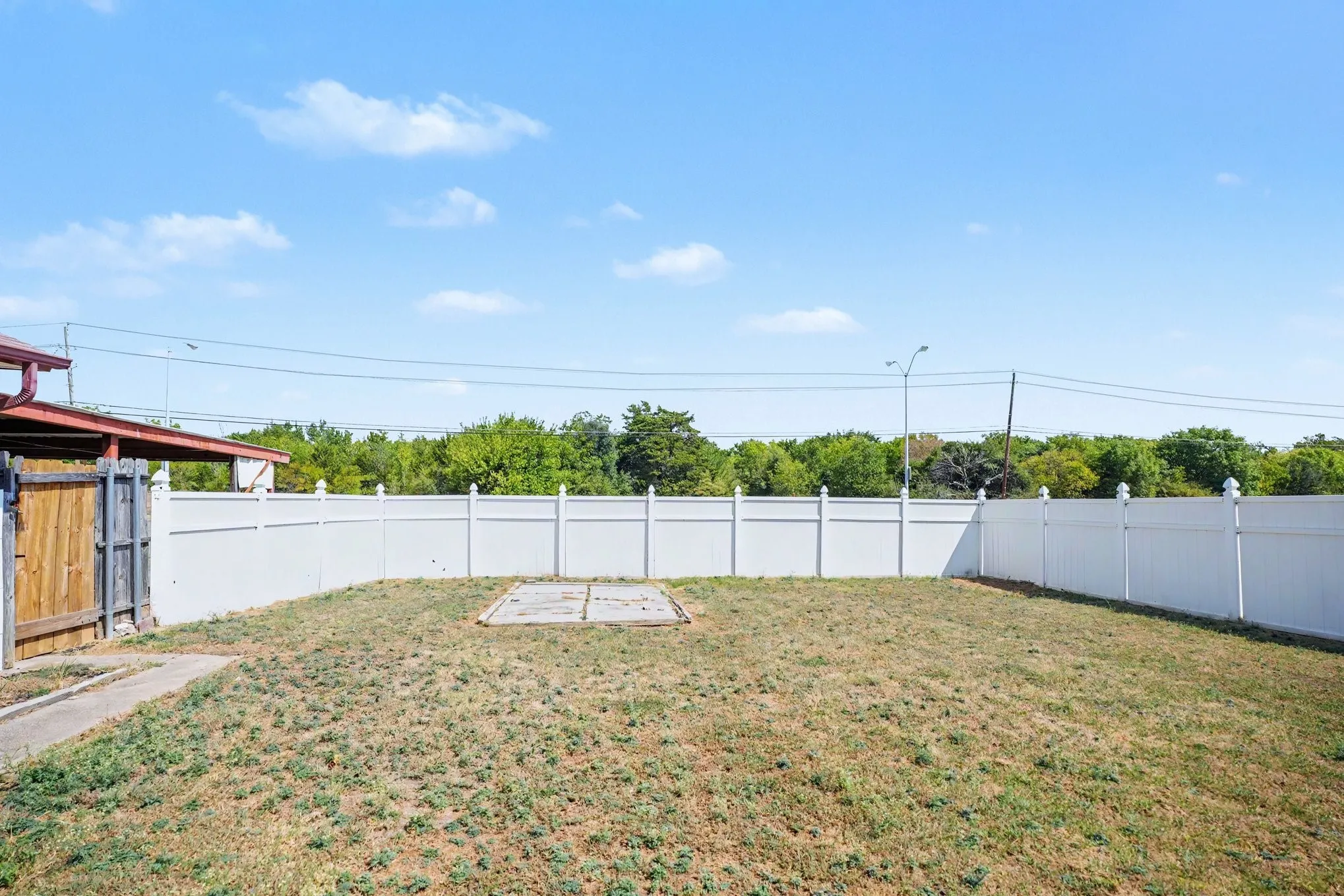 Nice large backyard with vinyl fencing