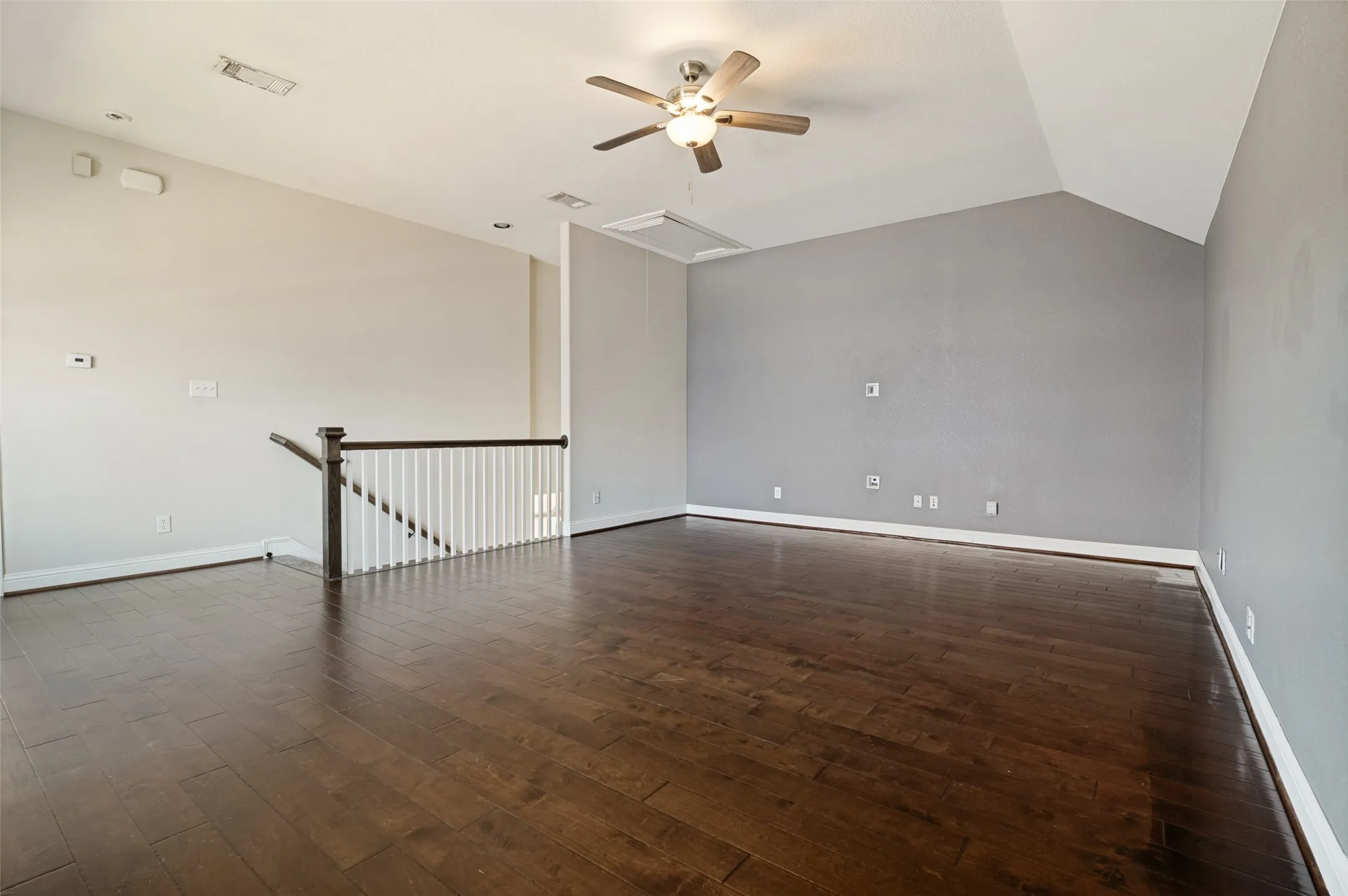 Vaulted ceiling with a ceiling fan light fixture