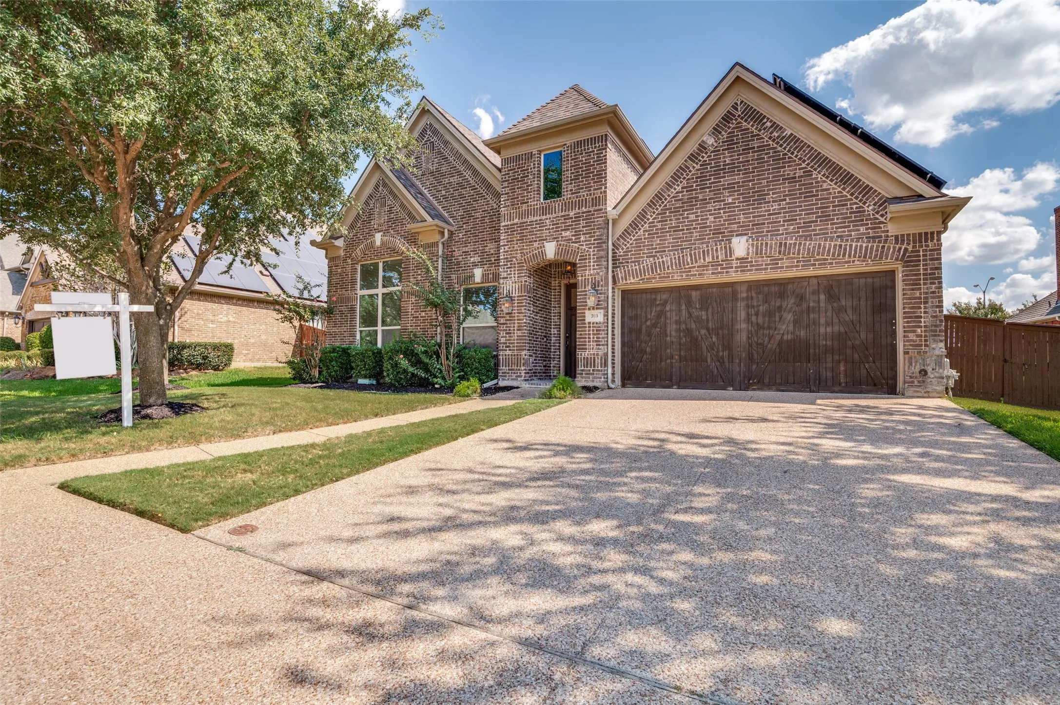 Brick exterior facade with stone accents