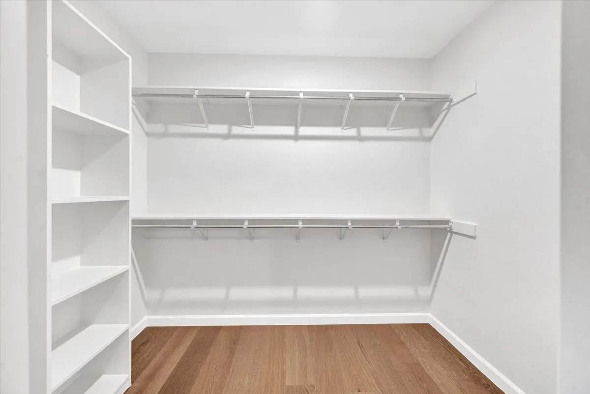 One of two large walk-in closets in Primary