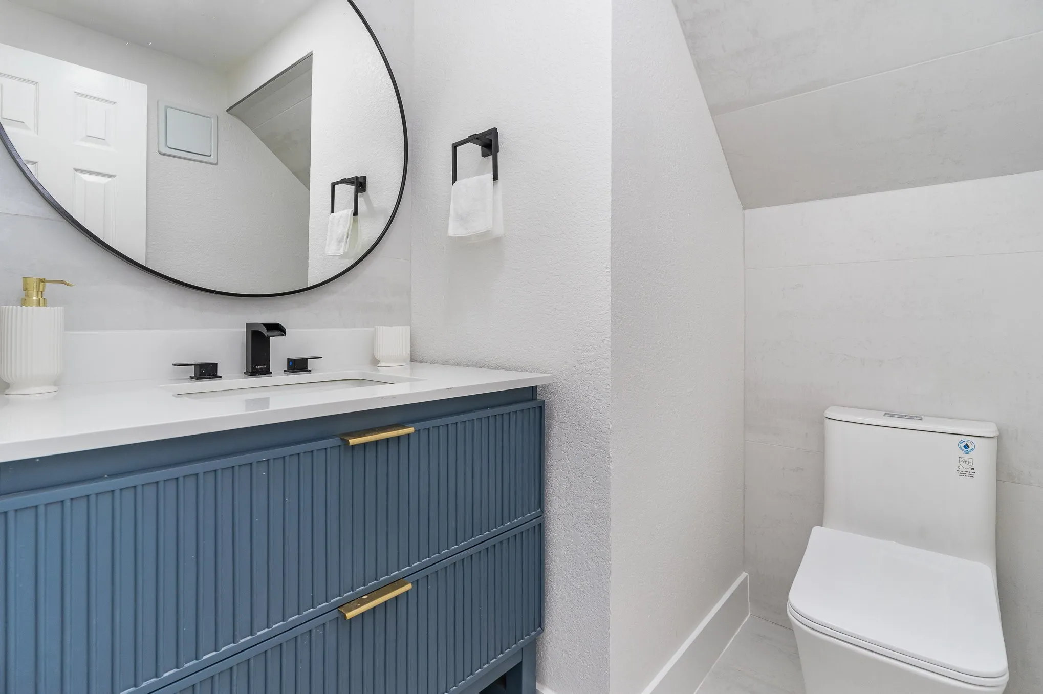 Bathroom featuring toilet and vanity