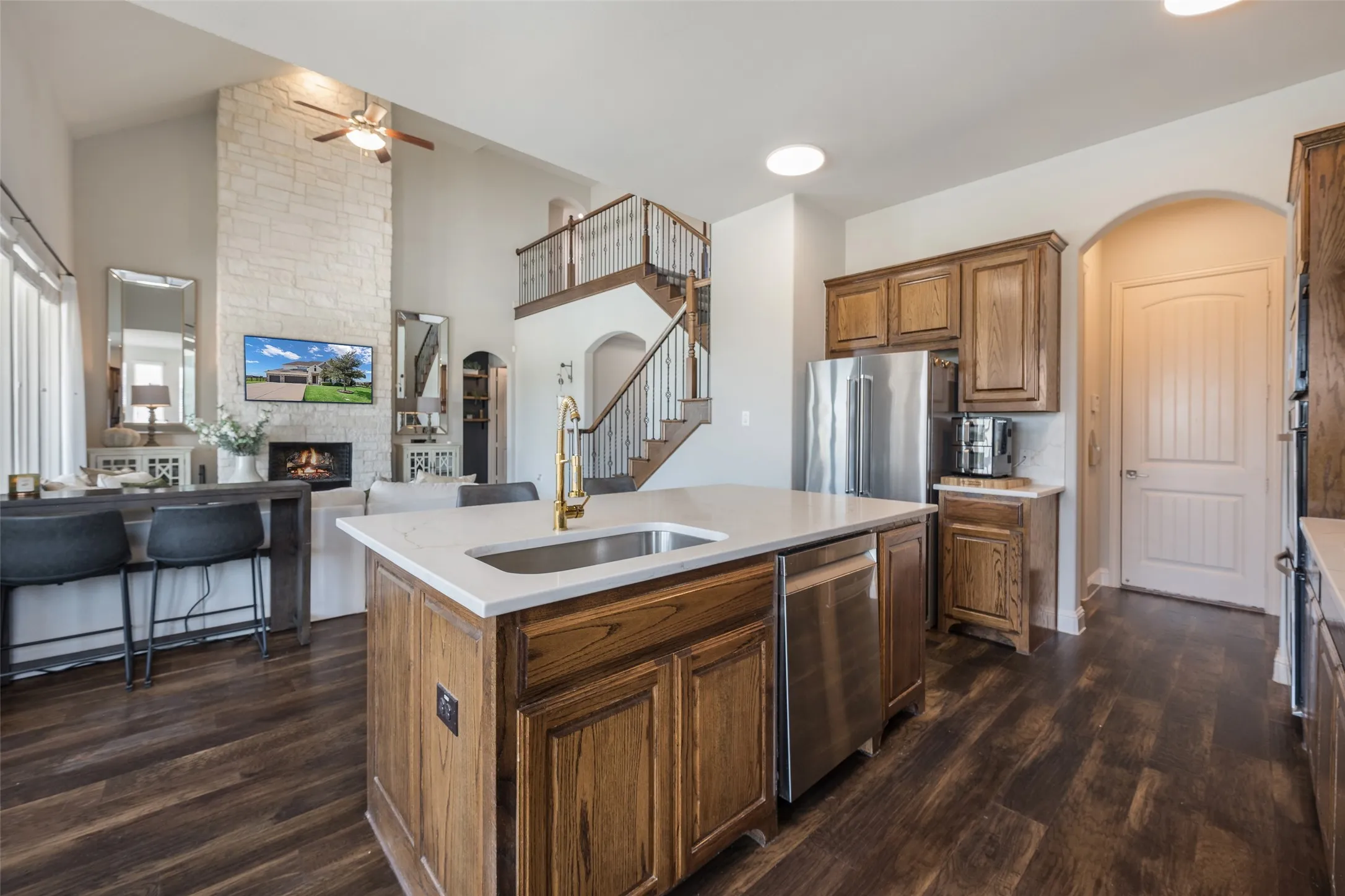 Kitchen island with built-in stainless steel sink and dishwasher