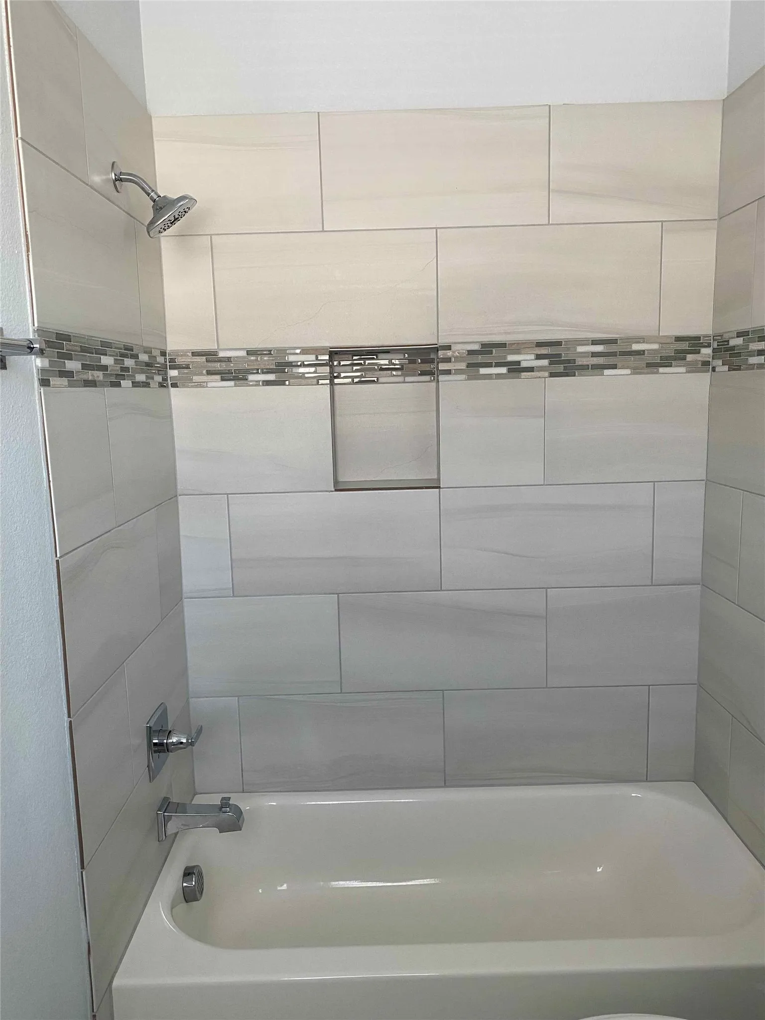 Bathroom with bathing tub / shower combination