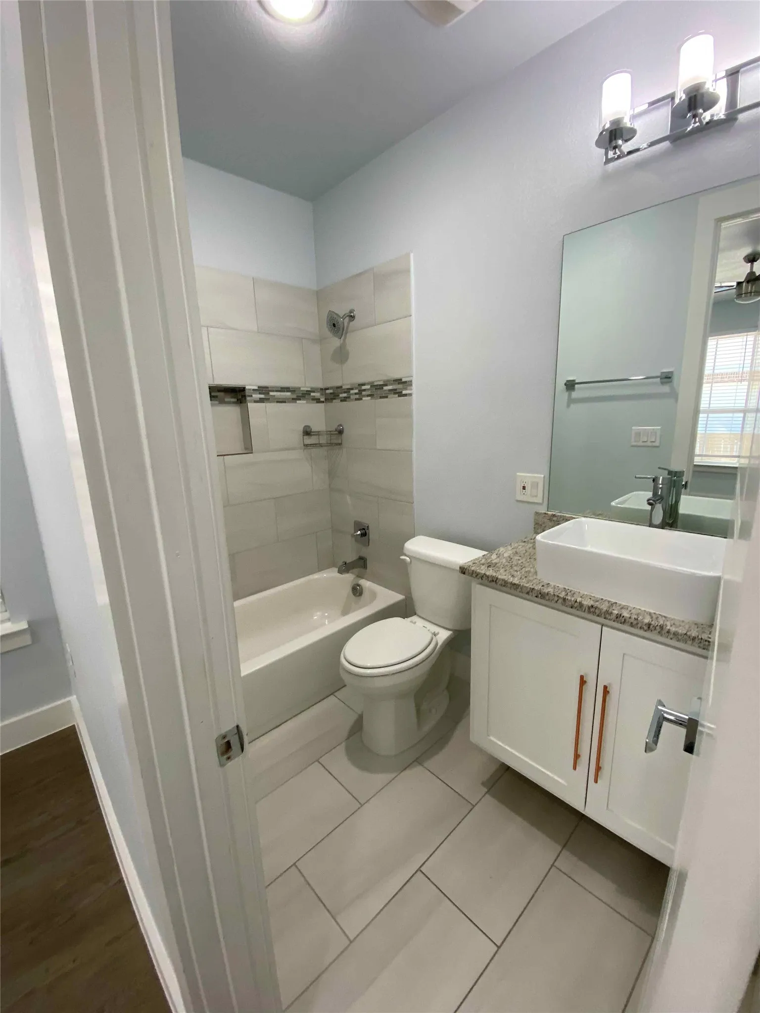 Full bathroom with vanity and  shower combination