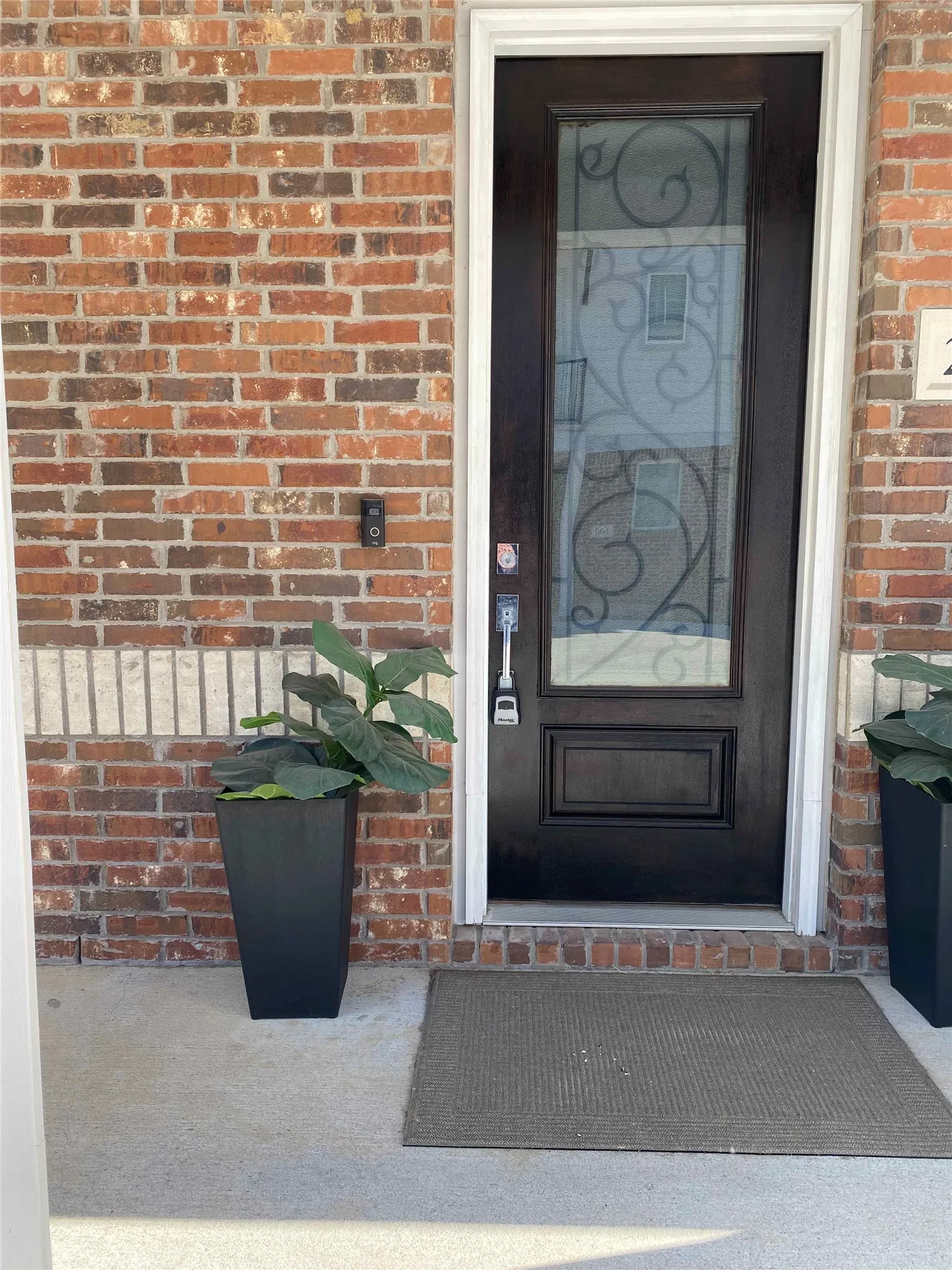 View of exterior entry featuring RING door bell camera