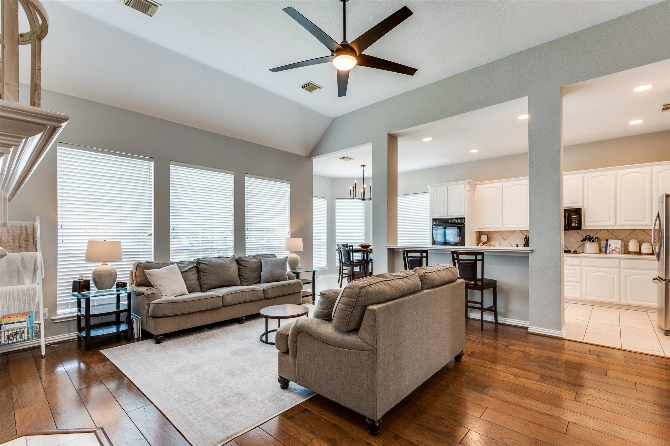 Living open to breakfast area and kitchen with breakfast bar