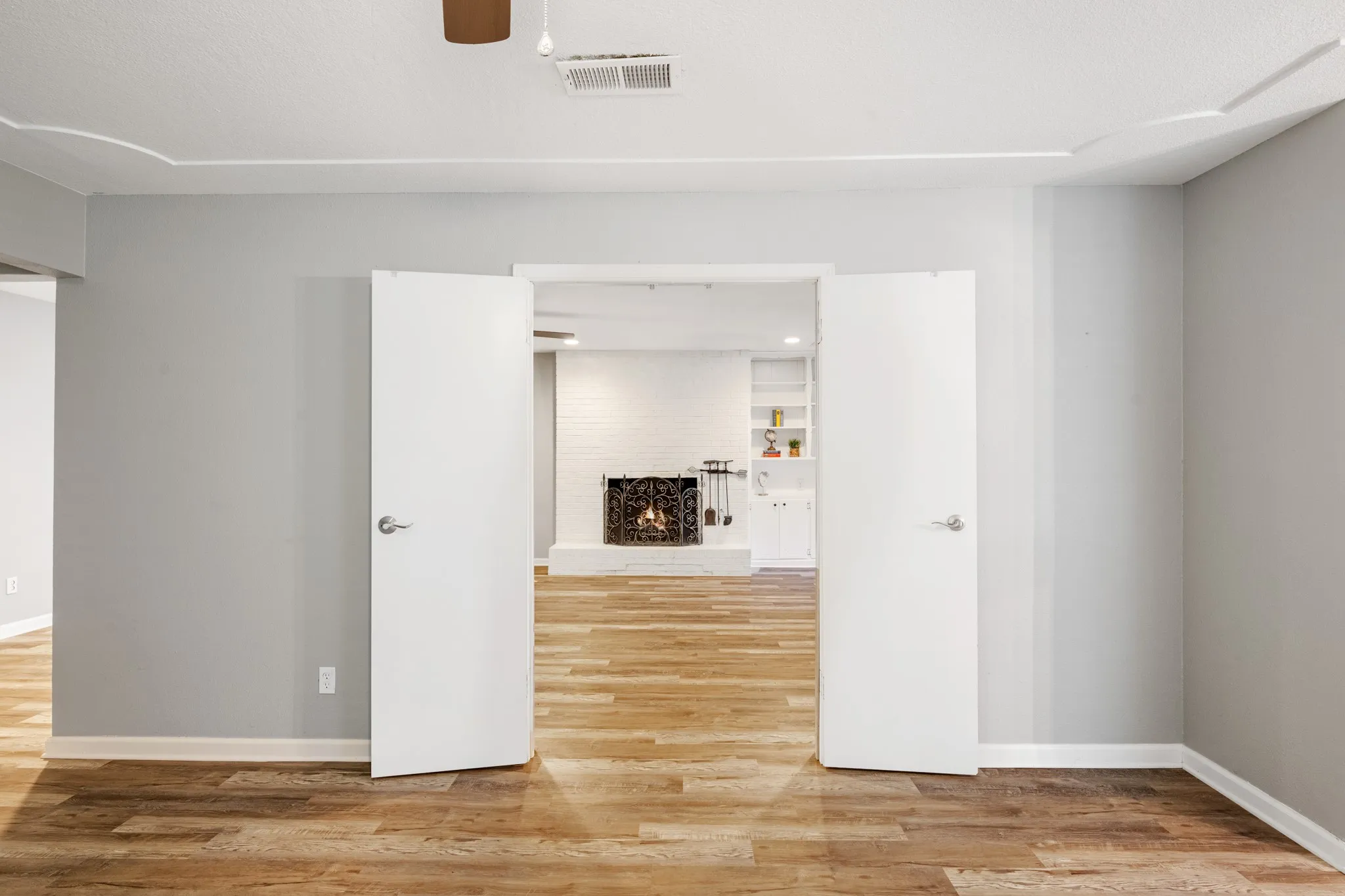 What a great feature! Open the two living areas for a spacious, connected feel, or close them off when you want separate spaces.