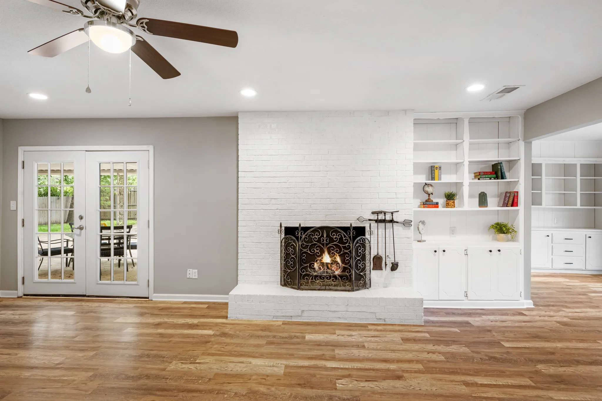 Cozy fireplace with built-ins to showcase your treasures.