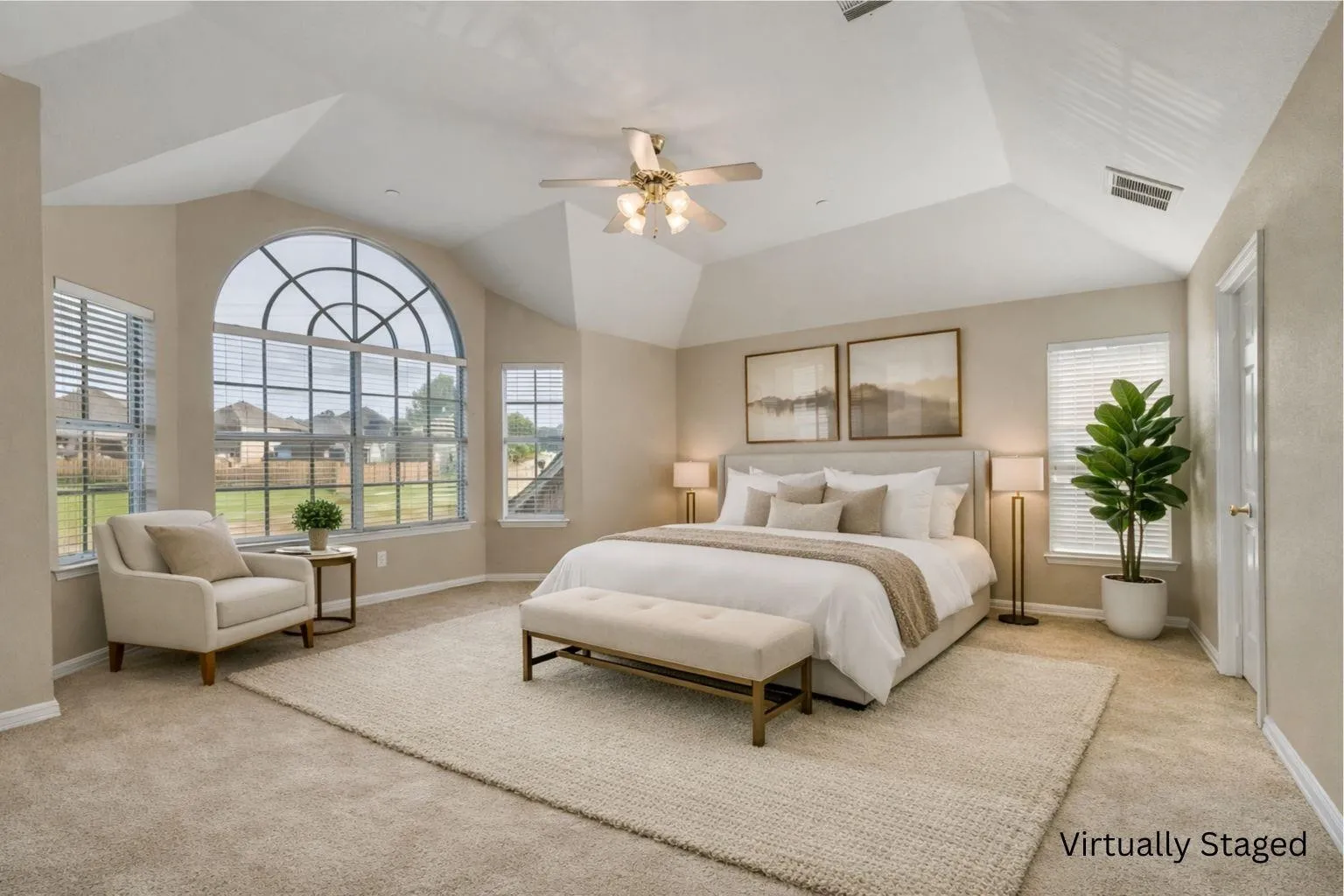 , arched window with Primary bedroom is upstairs