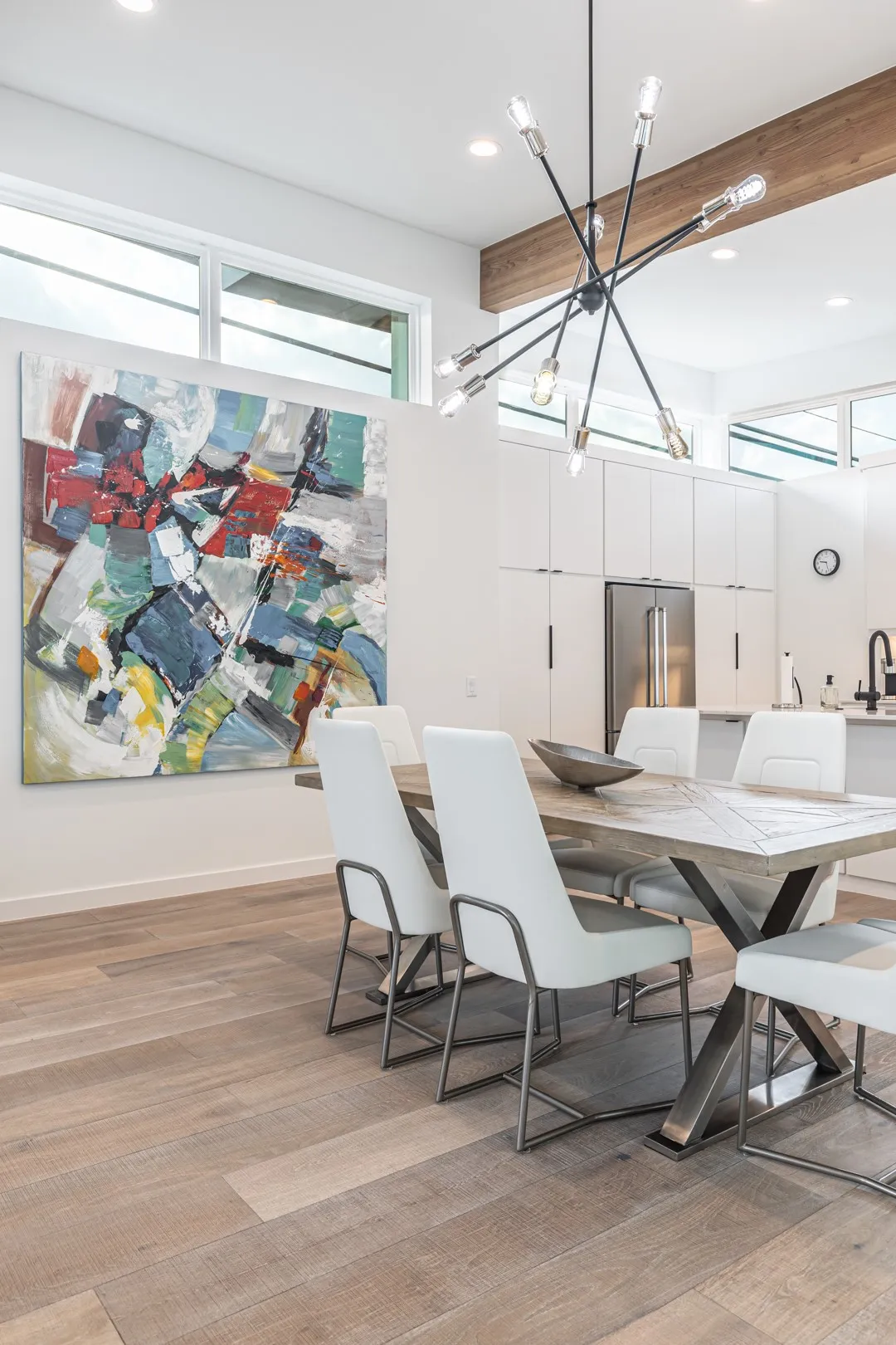 Dining space featuring healthy amount of natural light, recessed lighting, and light wood-style flooring