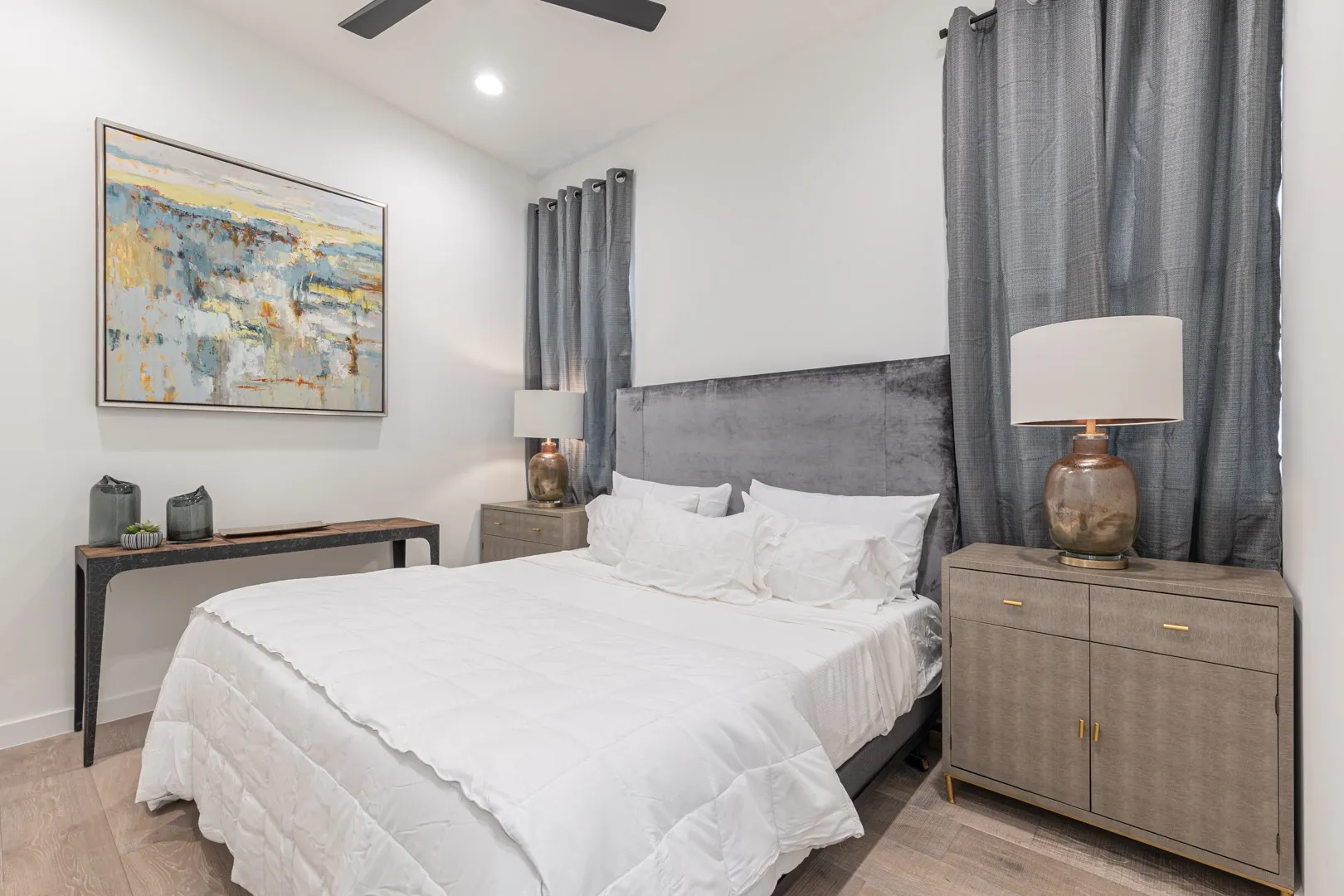 Bedroom with recessed lighting, wood finished floors, and a ceiling fan