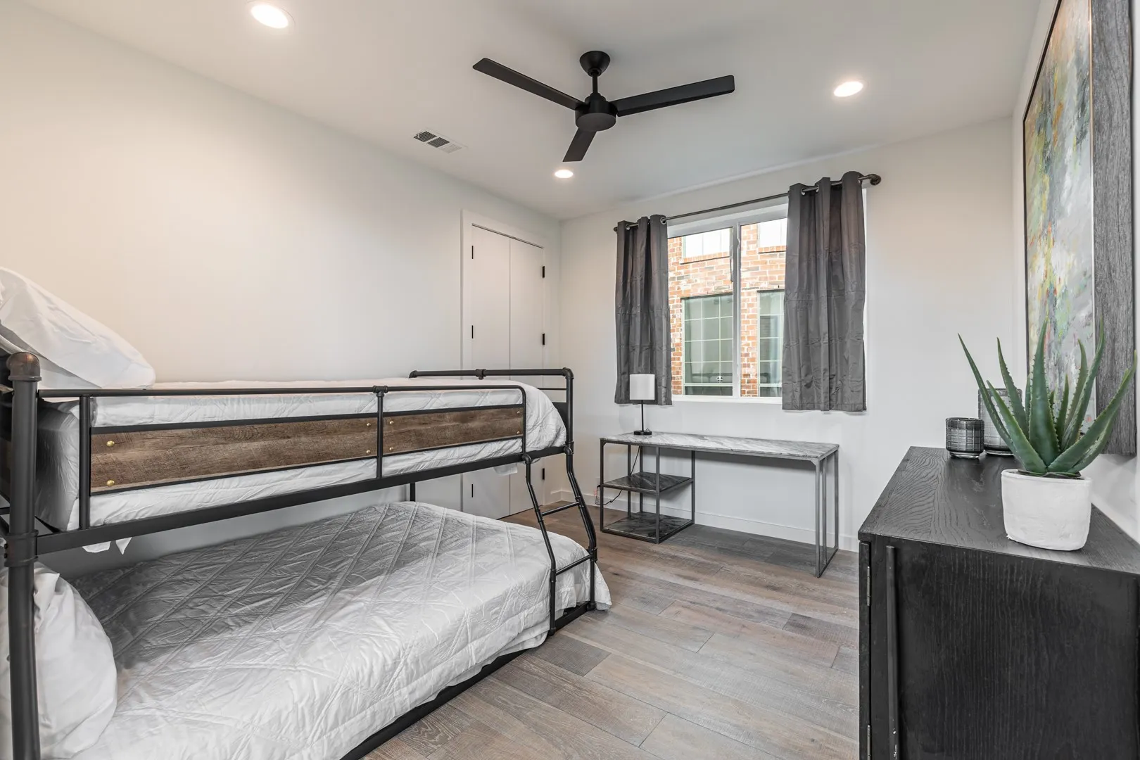 Bedroom featuring recessed lighting, wood finished floors, and ceiling fan