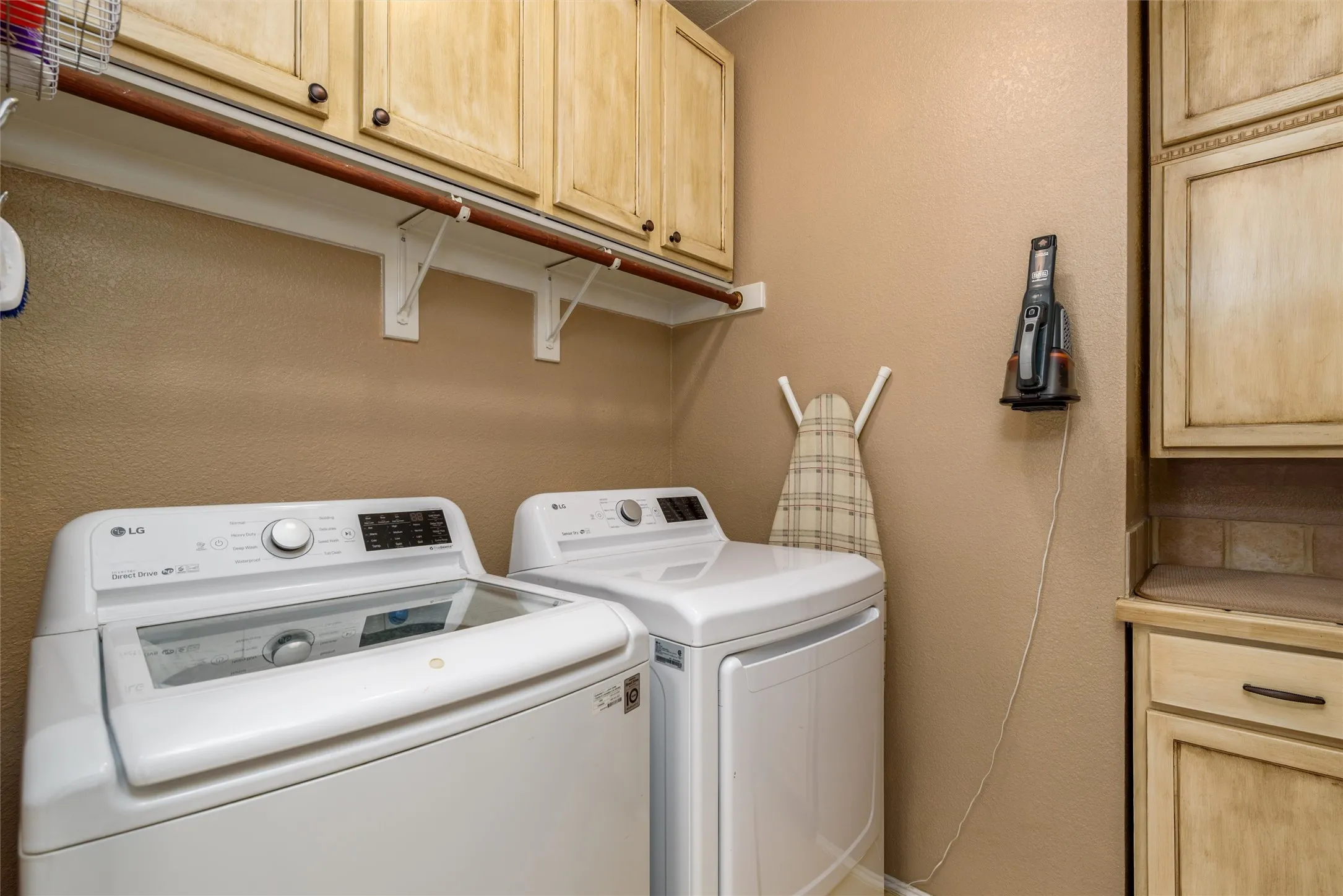 A utility room with plenty of storage.
