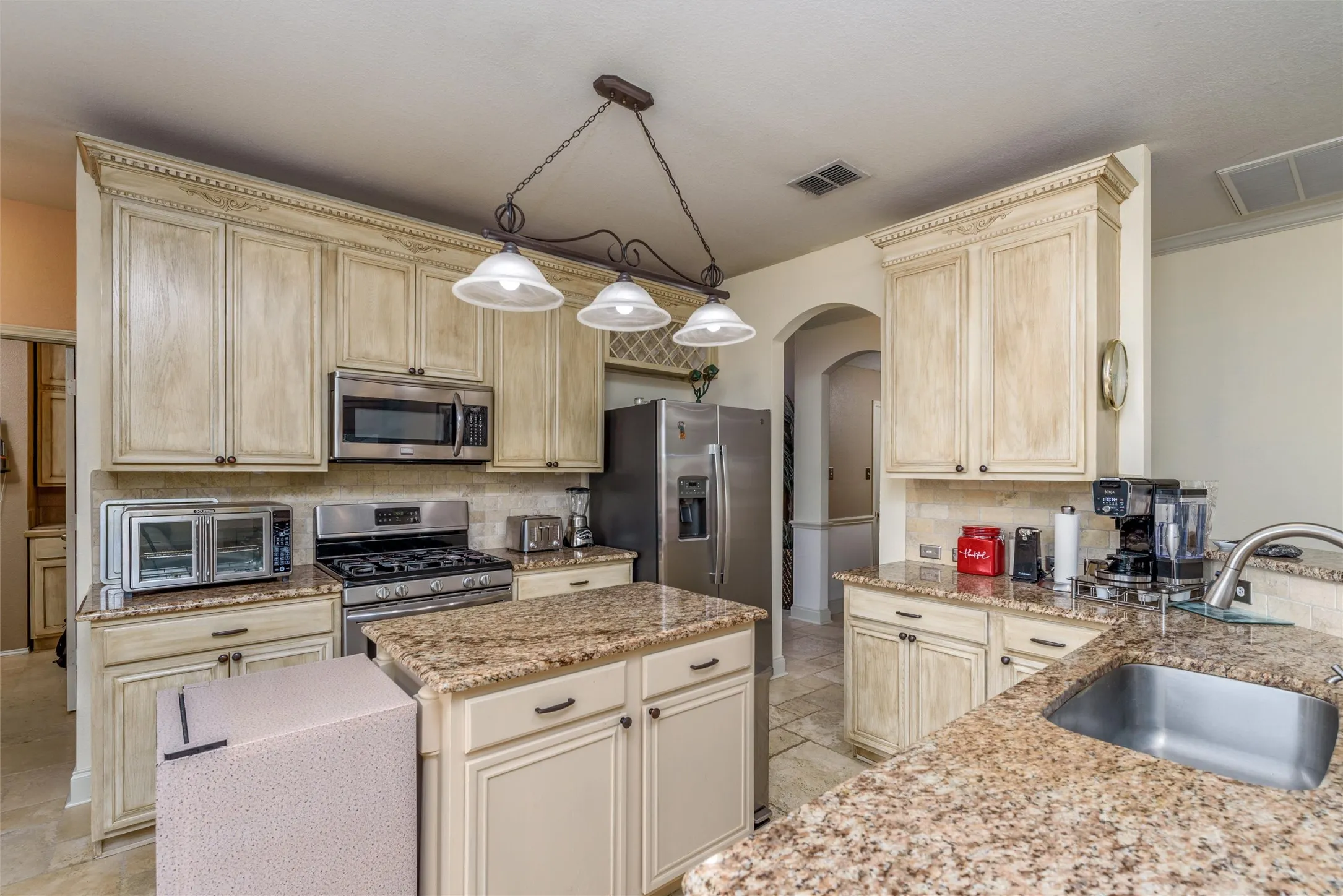 Your kitchen features stainless steel appliances and granite countertops.