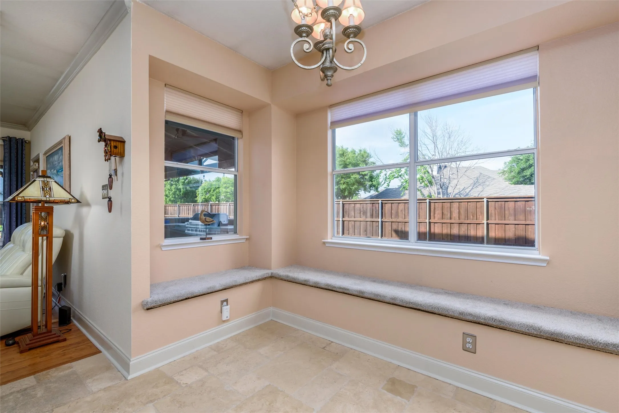 Your eat in kitchen space with window benches overlooking the side yard