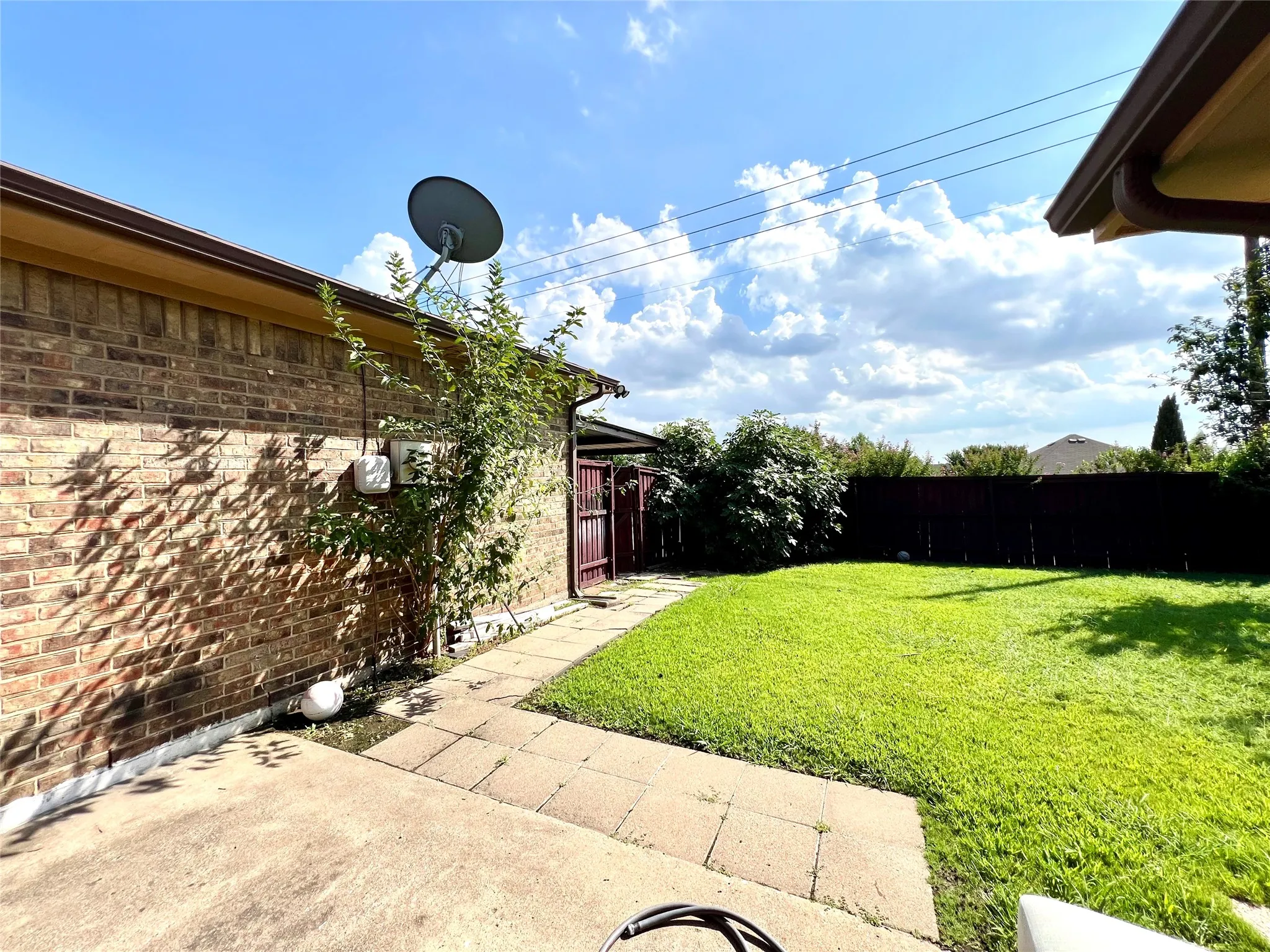 View of yard with a patio