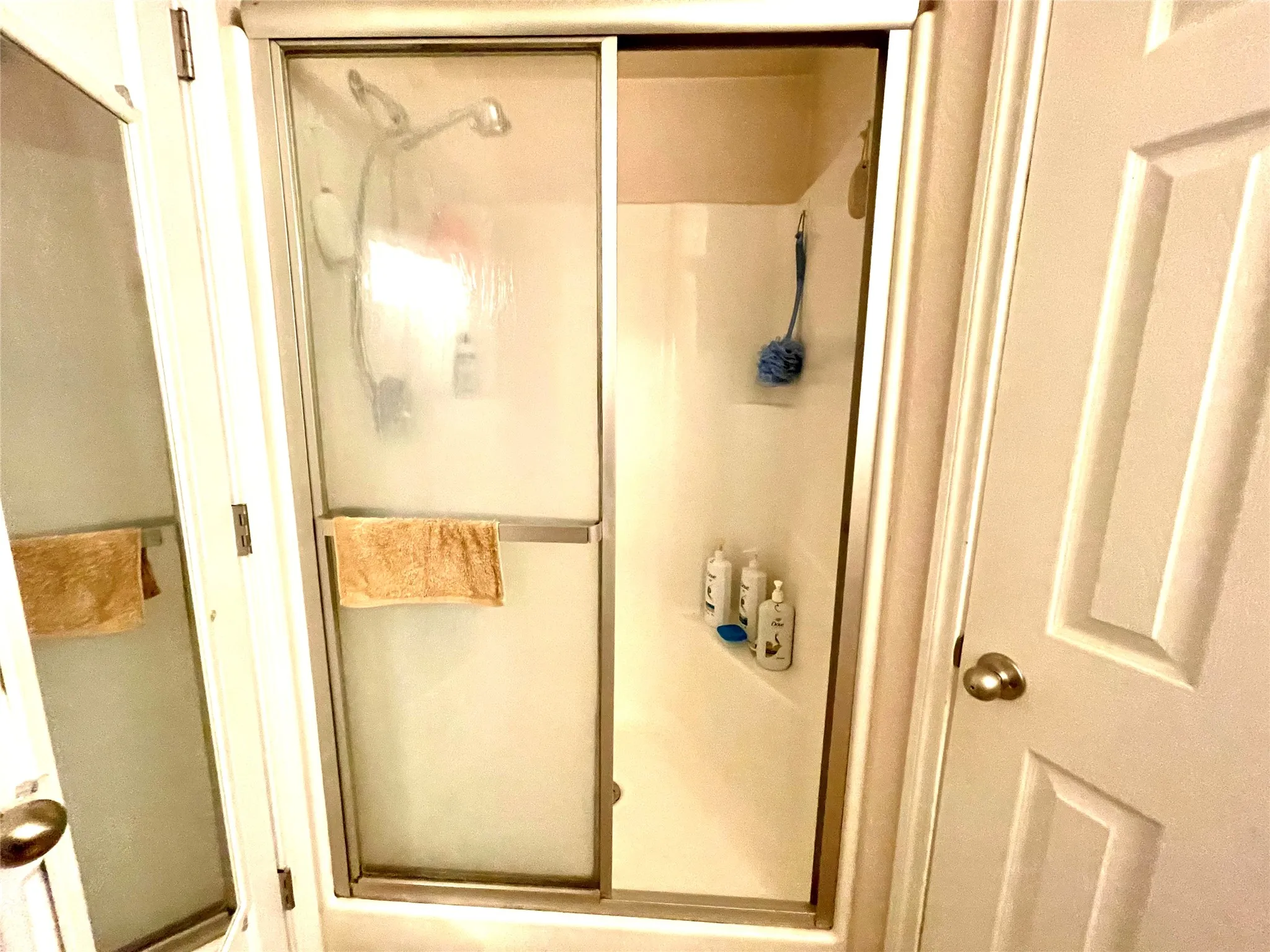 Bathroom with an enclosed shower