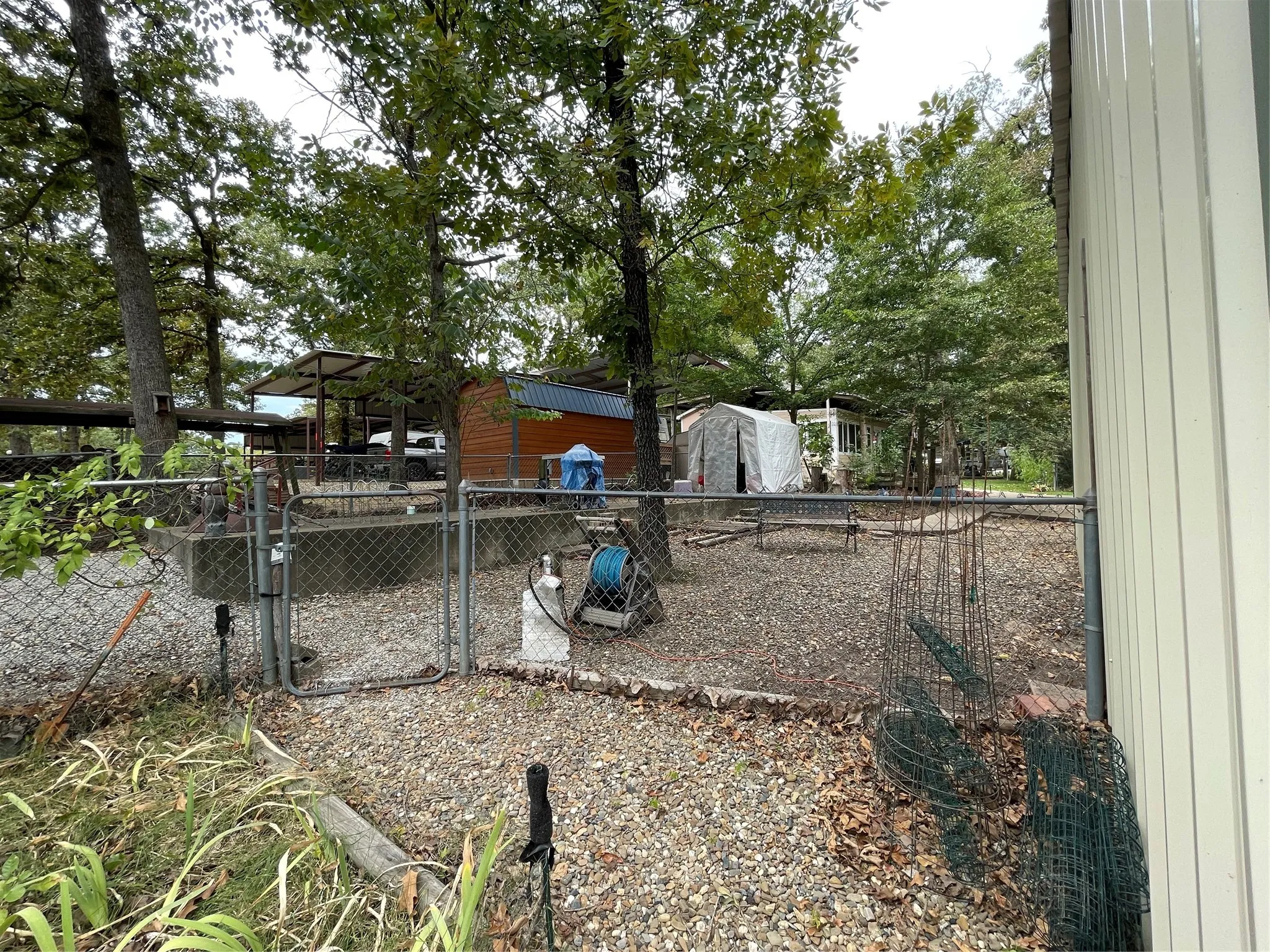 View of yard featuring a storage unit