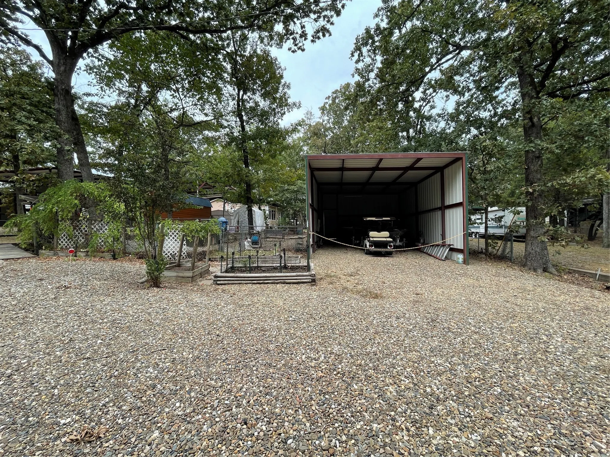 View of outdoor structure featuring a carport