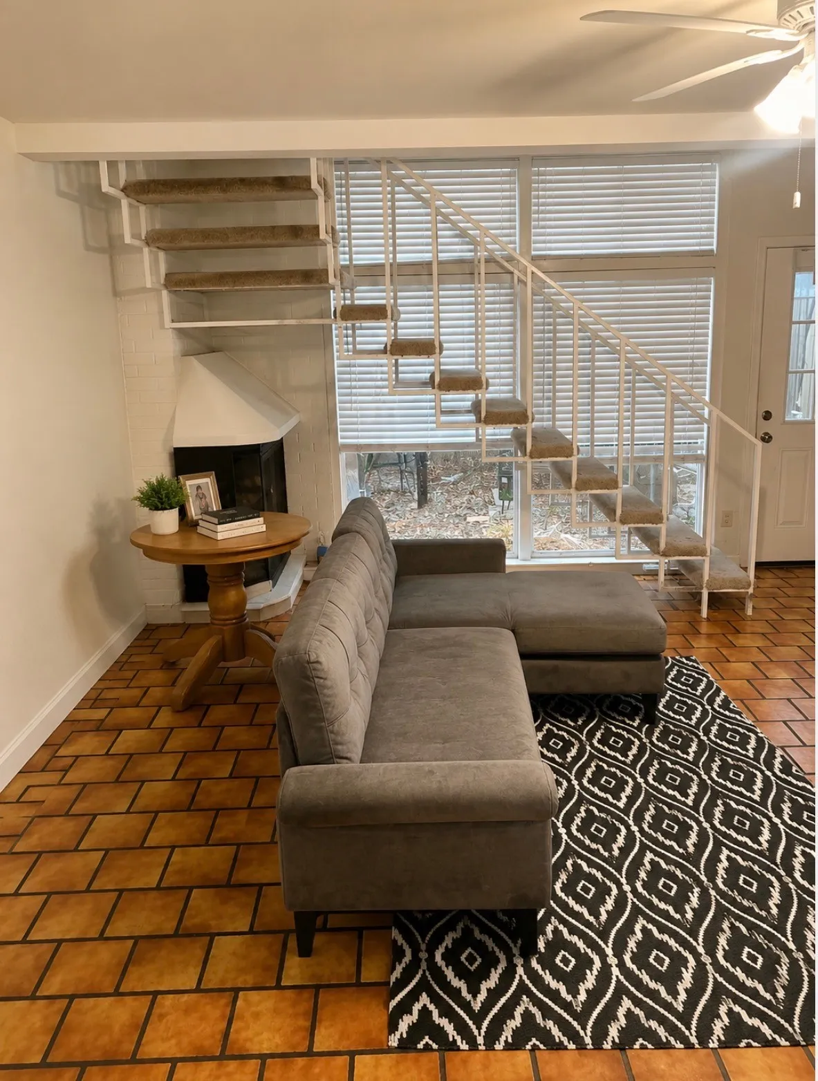 Orange tile will be replaced with wood vinyl