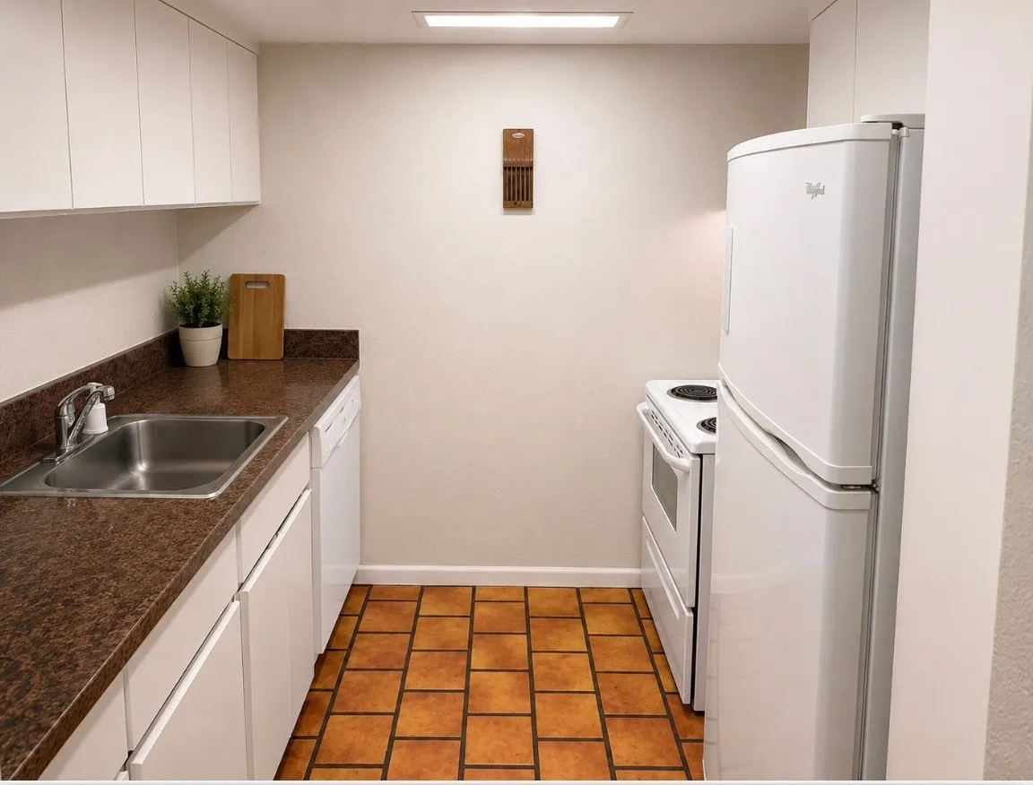 Orange tile will be replaced with wood vinyl