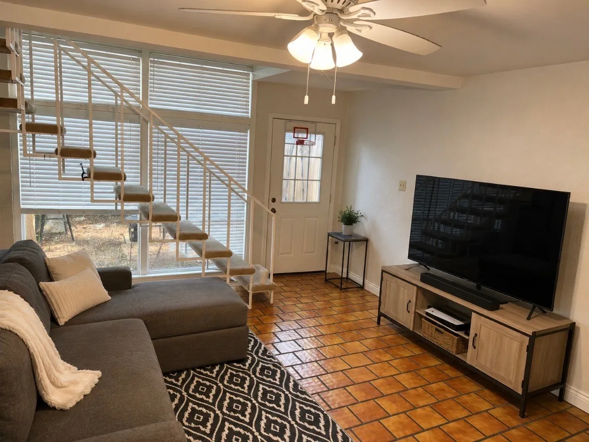 Orange tile will be replaced with wood vinyl