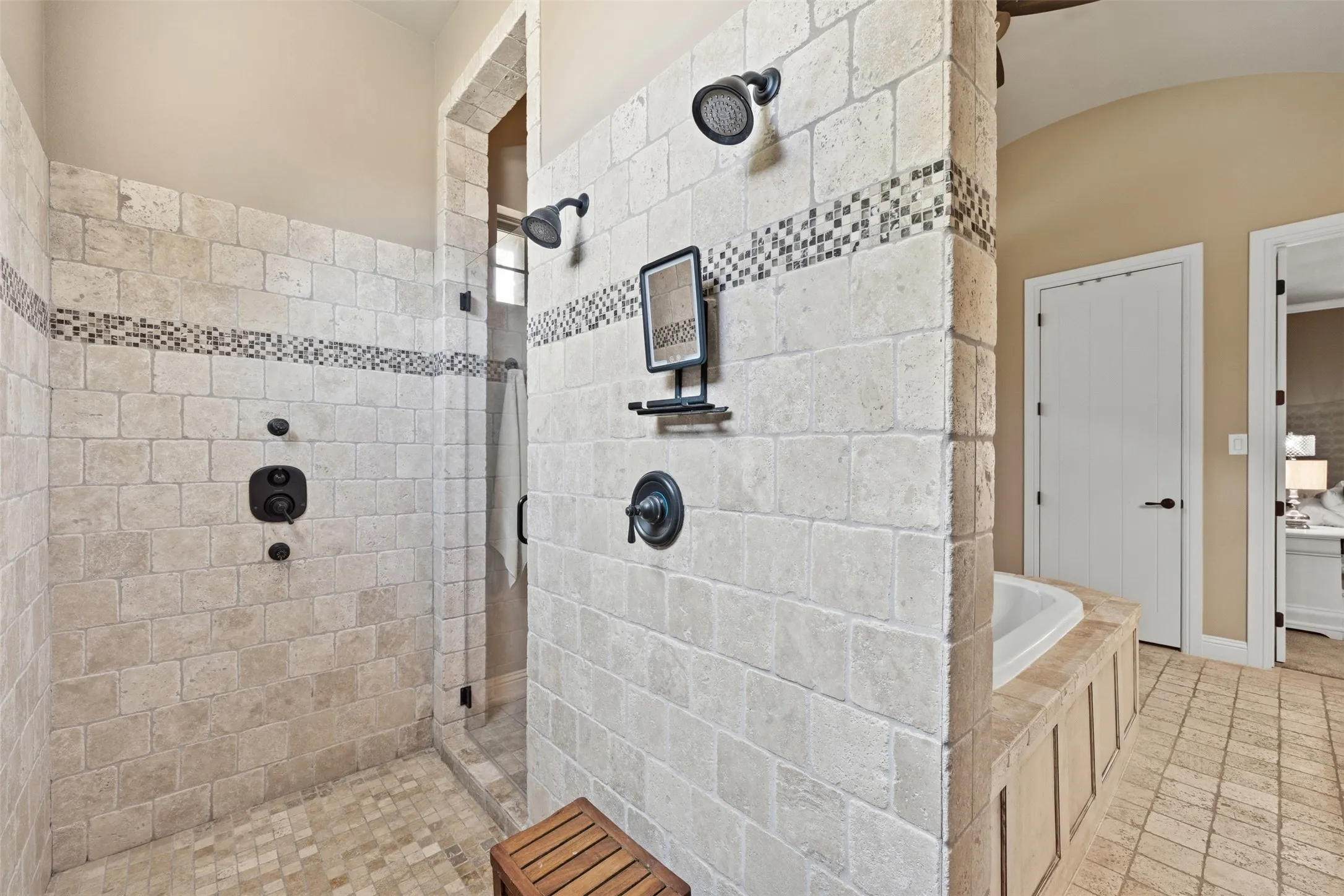 Primary shower with multiple shoer heads