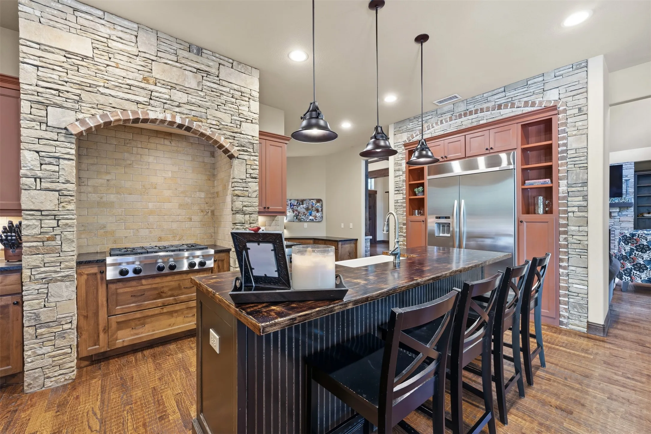 Six burner gas stove top and built in oversized refrigeration unit
