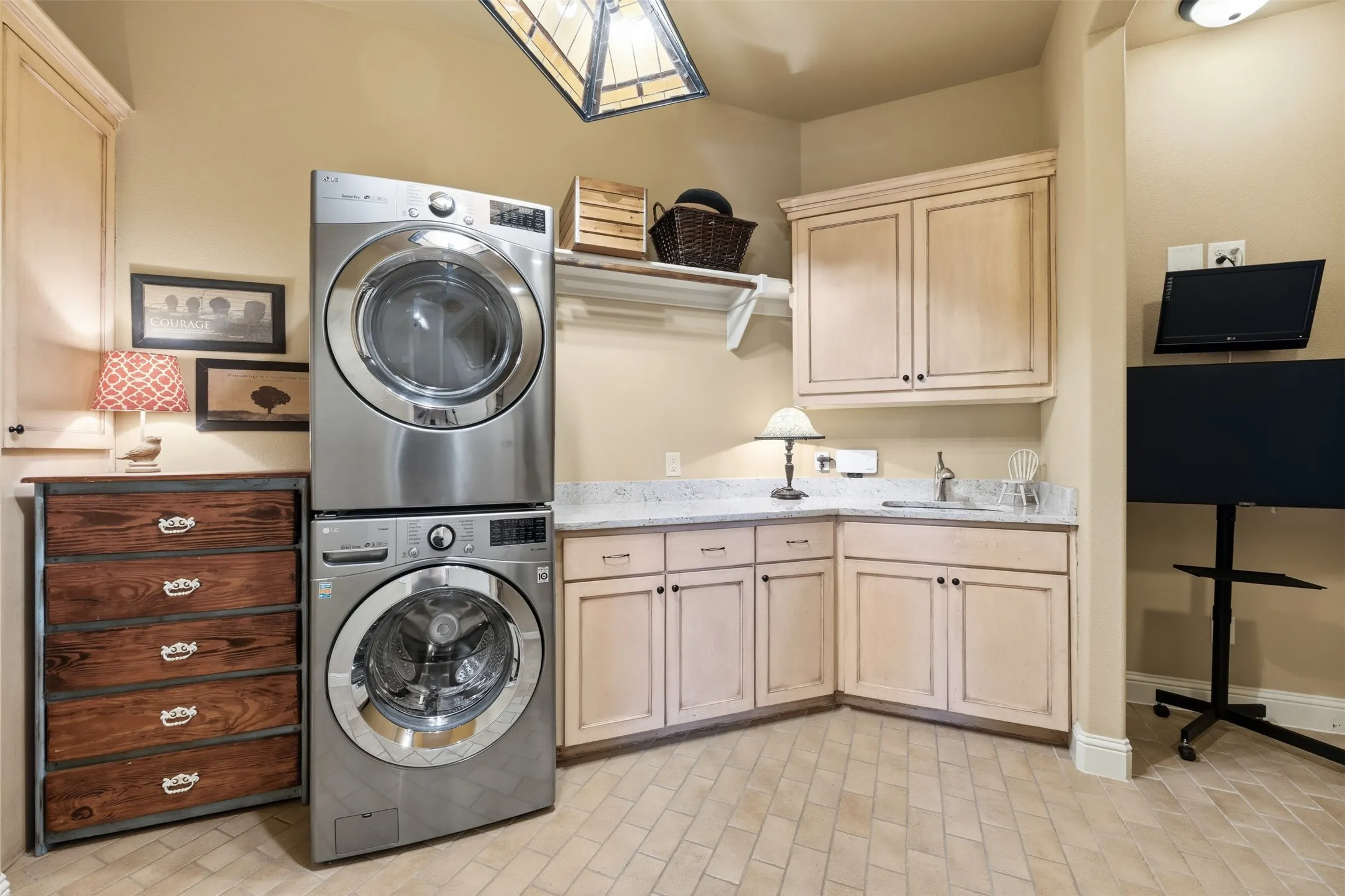 Large laundry room with tons of built in storage