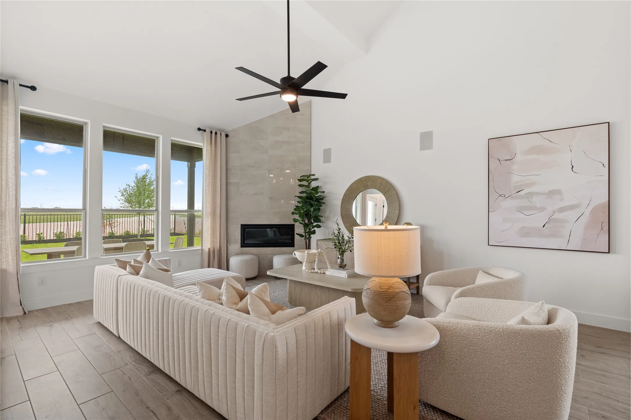 *Model Representation - Spacious gathering room with large windows