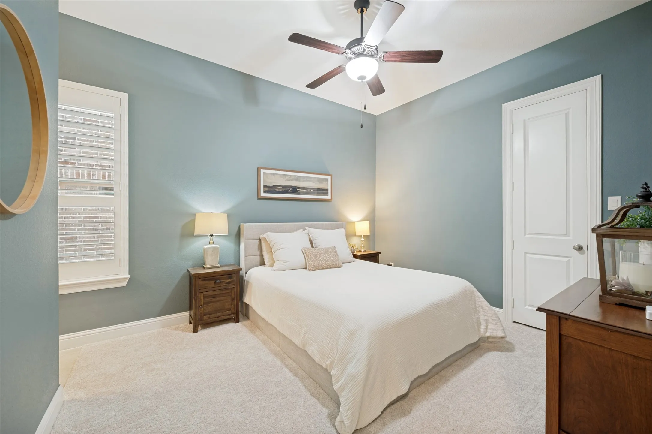 A welcoming first-floor guest suite offers comfort and privacy with a spacious bedroom, soft carpeting, and plenty of natural light. Complete with its own private ensuite bath and walk-in closet, this thoughtfully designed retreat is perfect for overnight guests or multigenerational living.