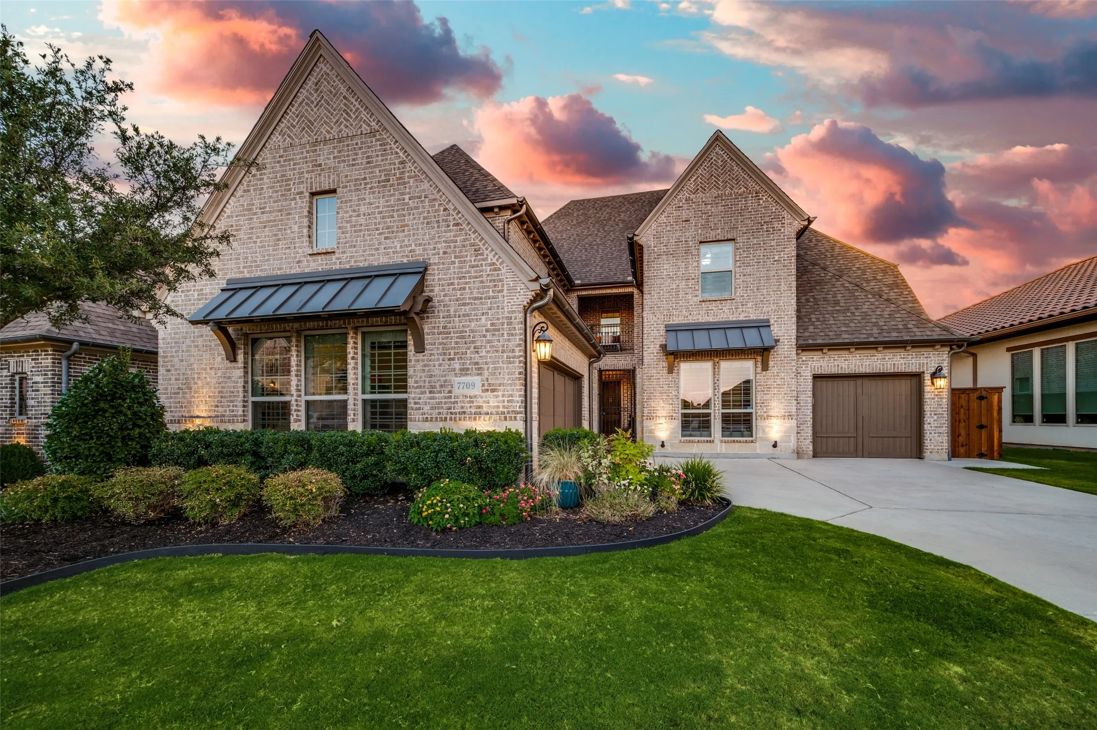 Welcome to 7709 Ivey. An impressive Darling Home nestled in the desirable Village of Tullamore Meadows, showcasing timeless architecture, beautiful brickwork, and exceptional curb appeal.