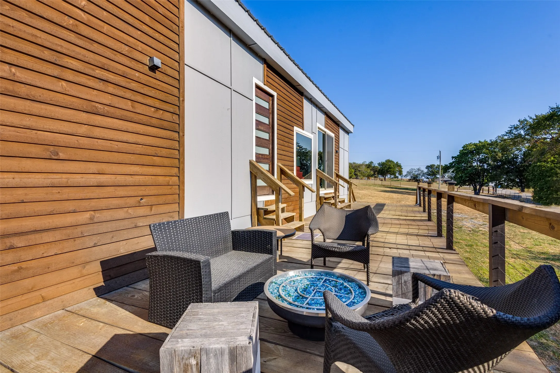Large front deck where you can enjoy seasonal lake views.