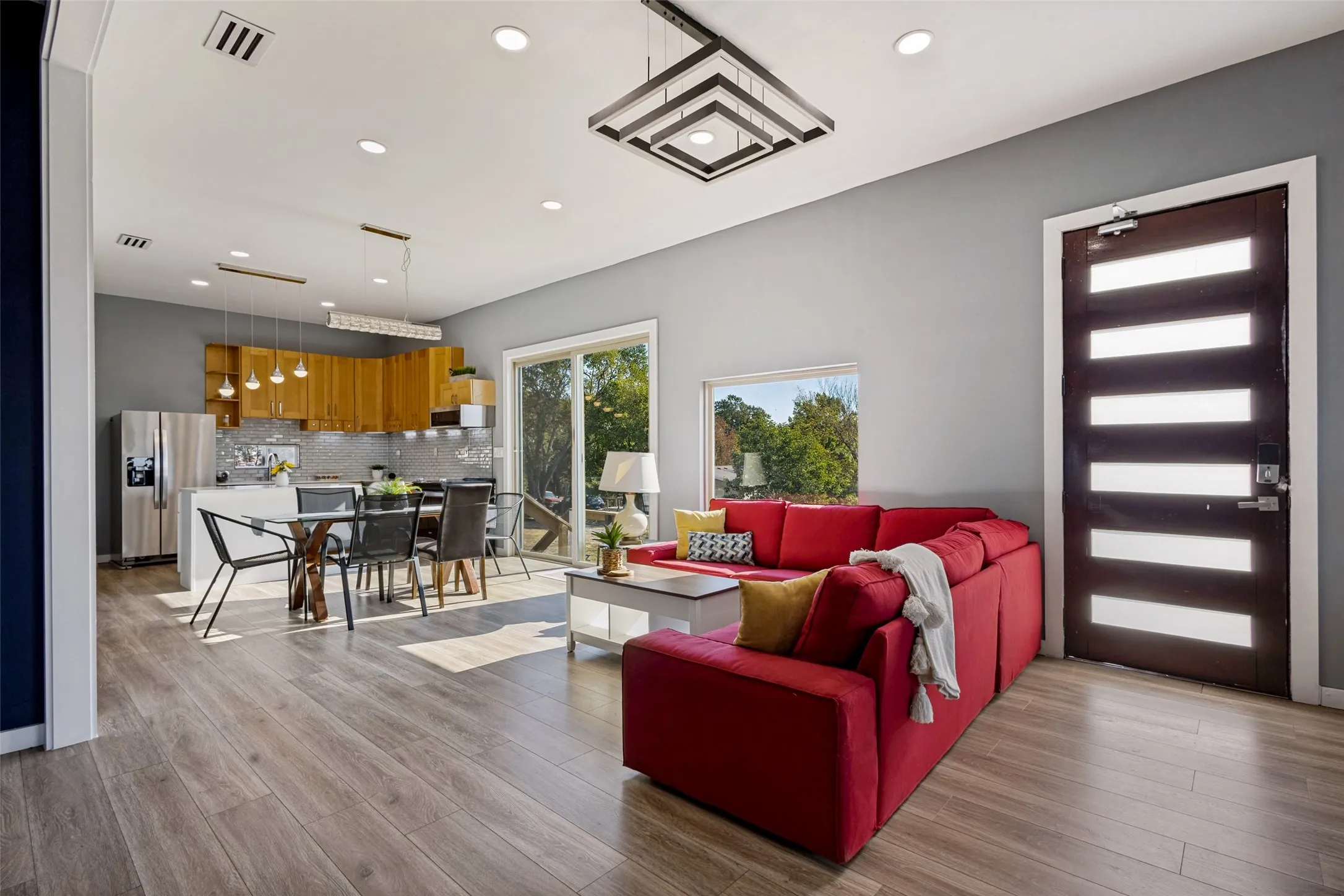 Open concept living, dining and kitchen.