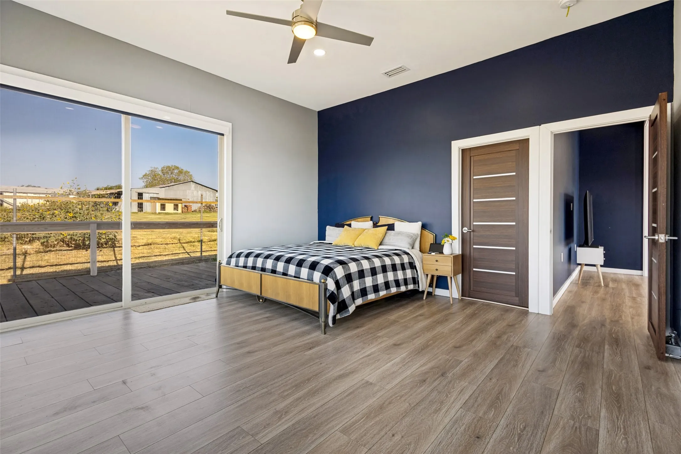 Another view of primary bedroom.