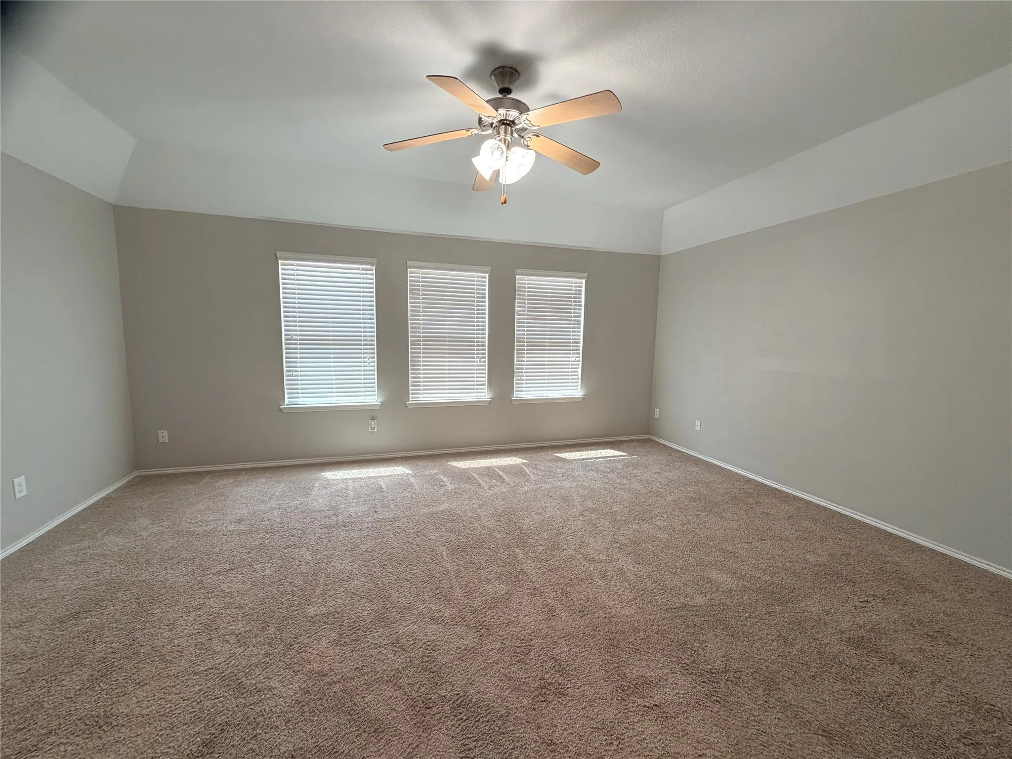 Tray ceiling with a built-in ceiling fan and light fixture