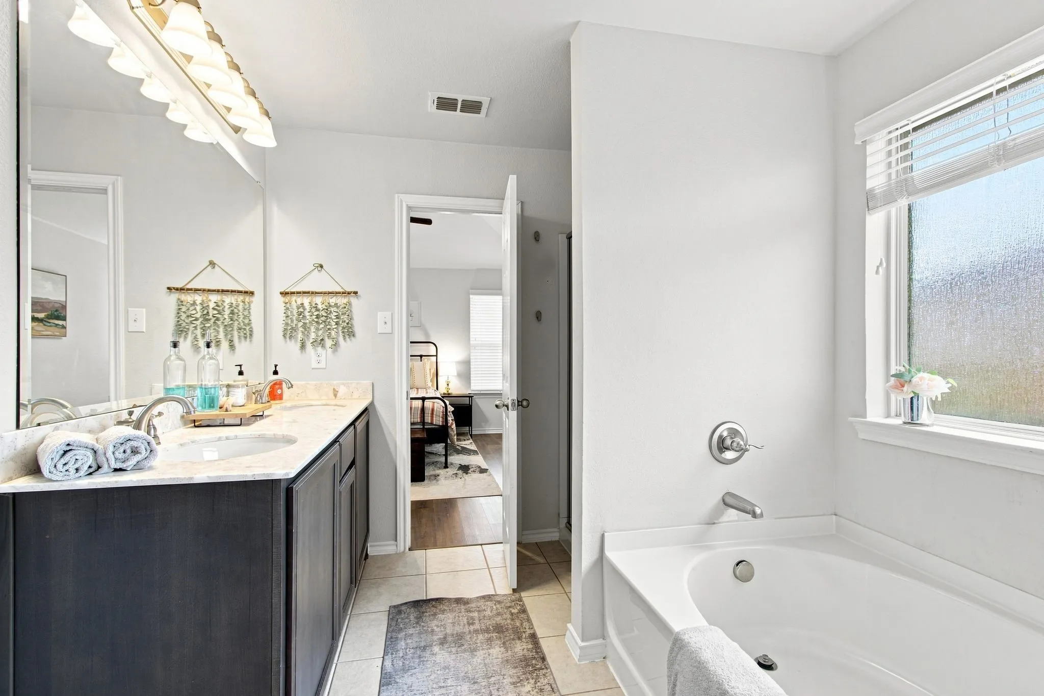 Built-in garden bathtub with window and separate shower. (not pictured is a huge walk in closet)