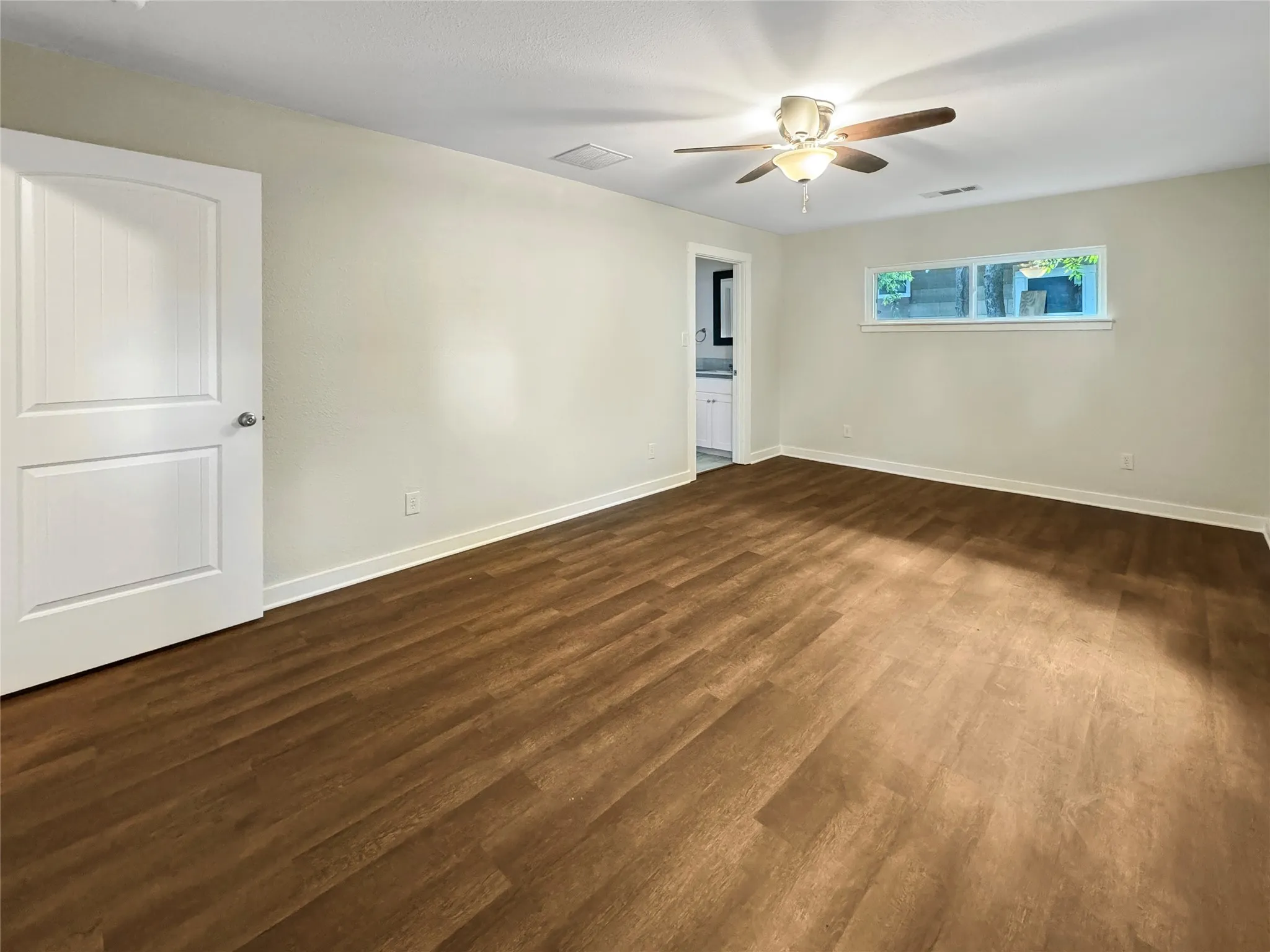 Primary Bedroom located at the back of the home