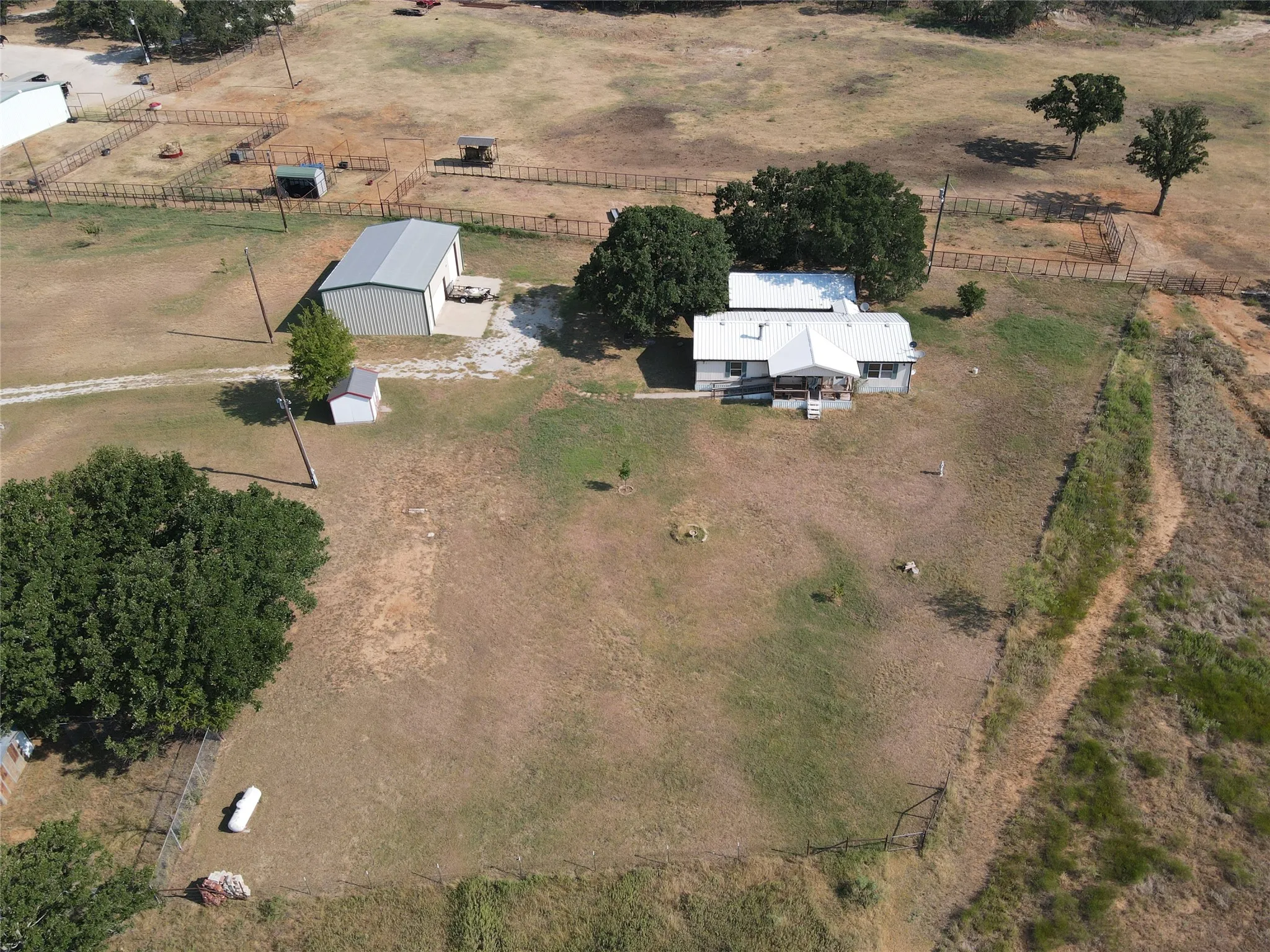 Mobile Home For Sale in Montague County , 1219 FM 2583, Bowie, Texas 76230, 3 Bedroom, 2 Bathroom, Garage spaces, 1,500 Sqft, built in 1980, mls#21376038, Real Estate Agent in Bowie, Homes For Sale in Montague county, Homes For Sale in Bowie, Realtor in Bowie Texas, Real Estate Brokerage Independent Realty Texas, Luminita Cordes Realtor