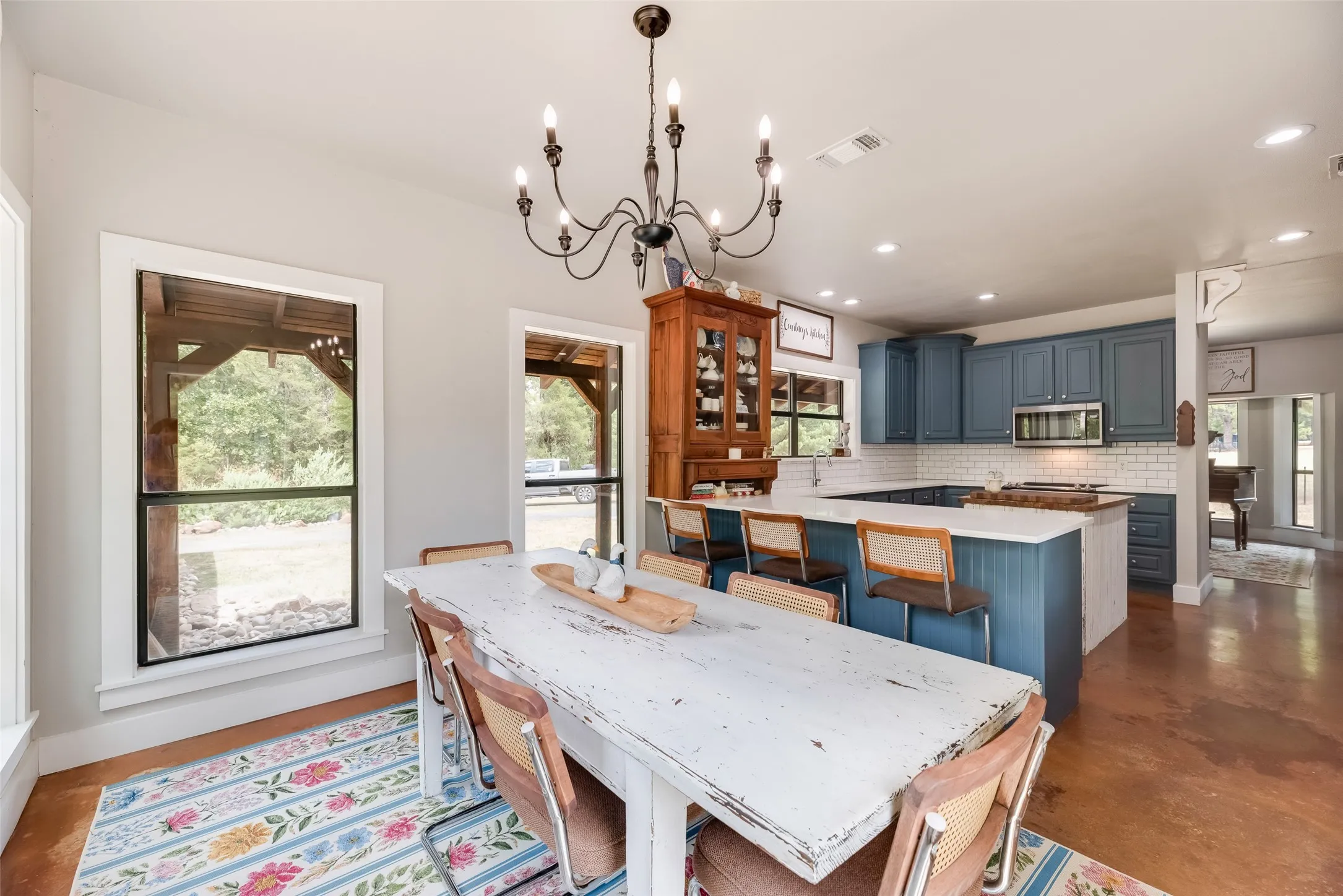 Kitchen with eat in breakfast nook and breakfast bar.