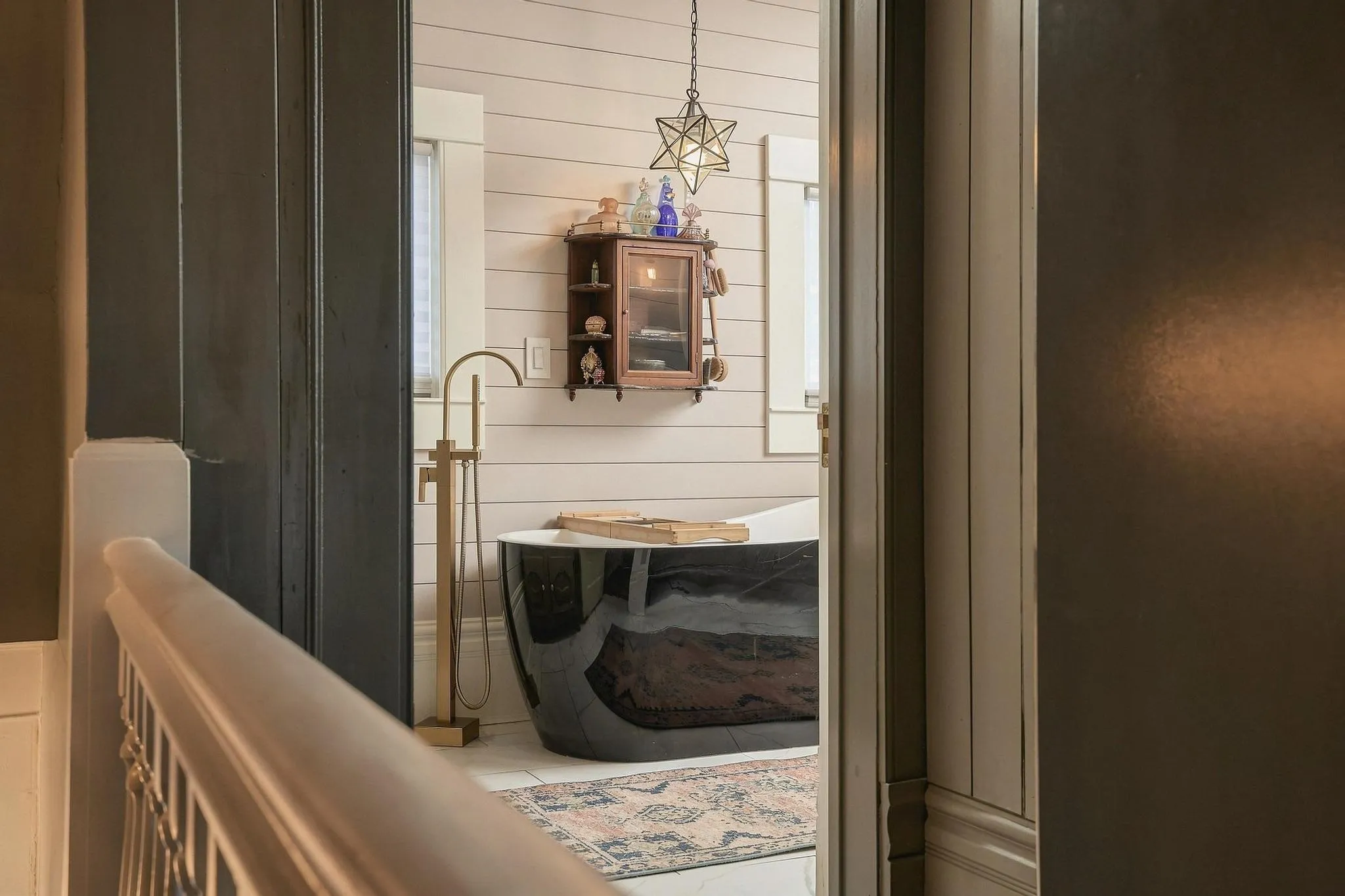 This photo captures the timeless historic beauty redefined with modern updates to create an exceptional and cohesive design throughout this home.