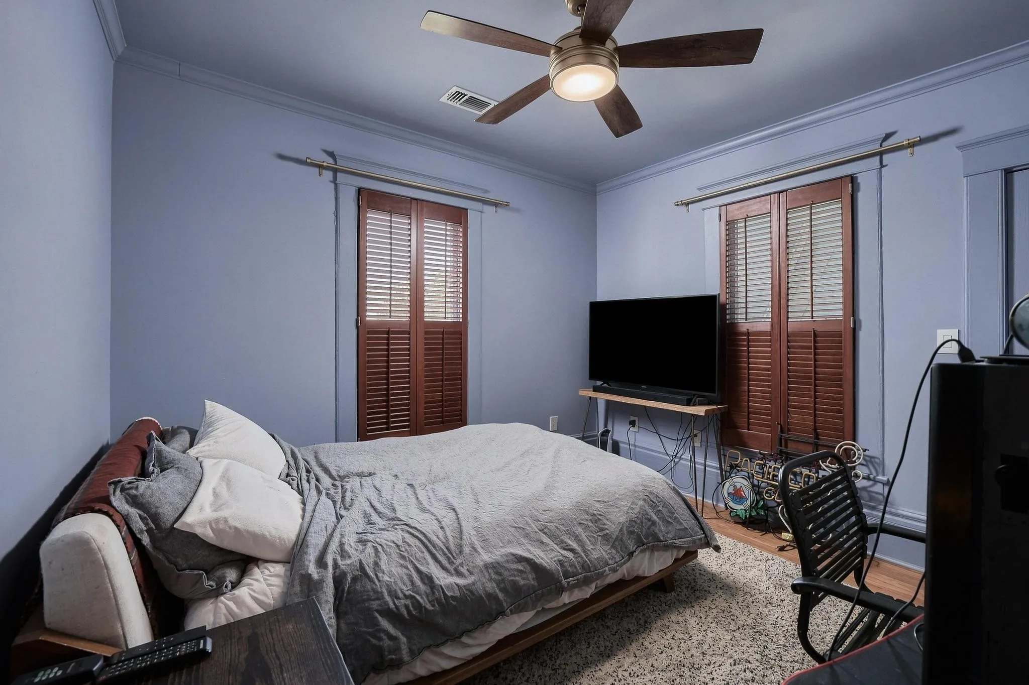 Beautiful color-drenched robin's egg blue palette and hardwood floors provide the perfect canvas to create whatever space you need.