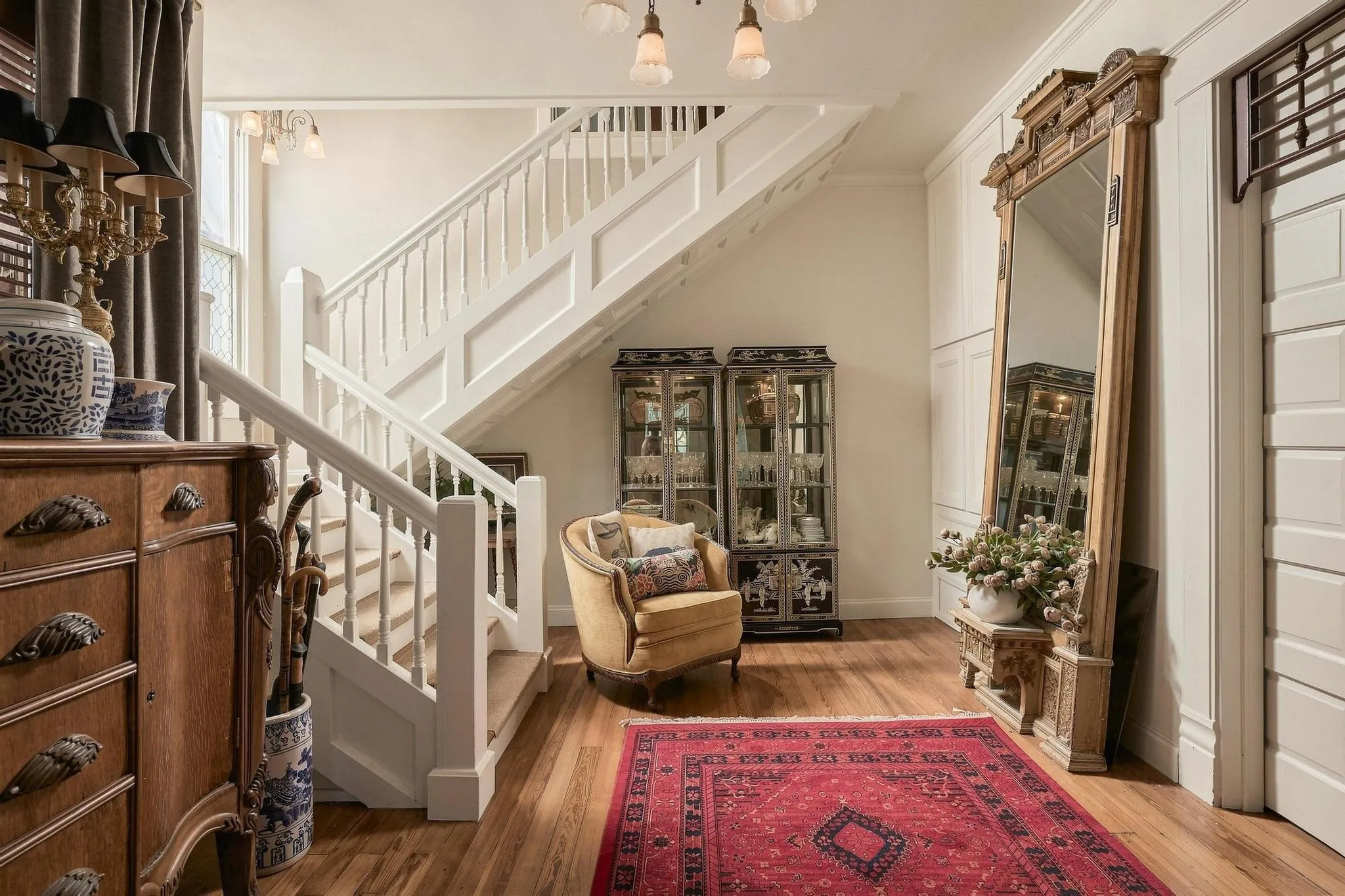 The Stunning Entrance Foyer Showcases the Original Staircase