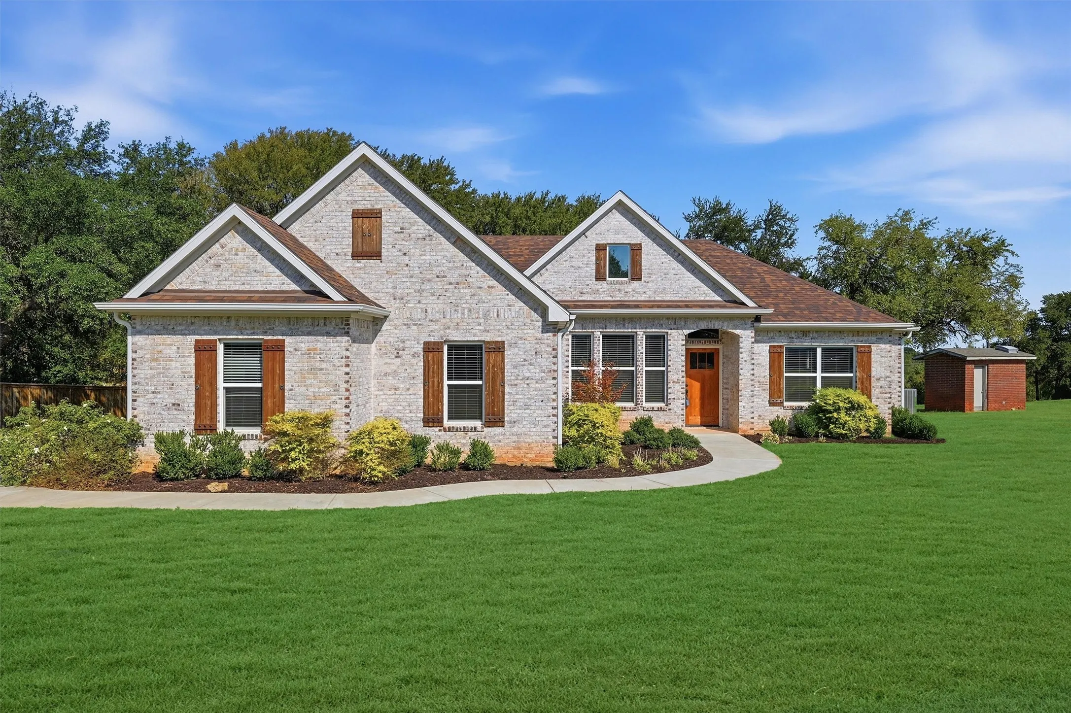 Front of your new Home landscaped and lush lawn