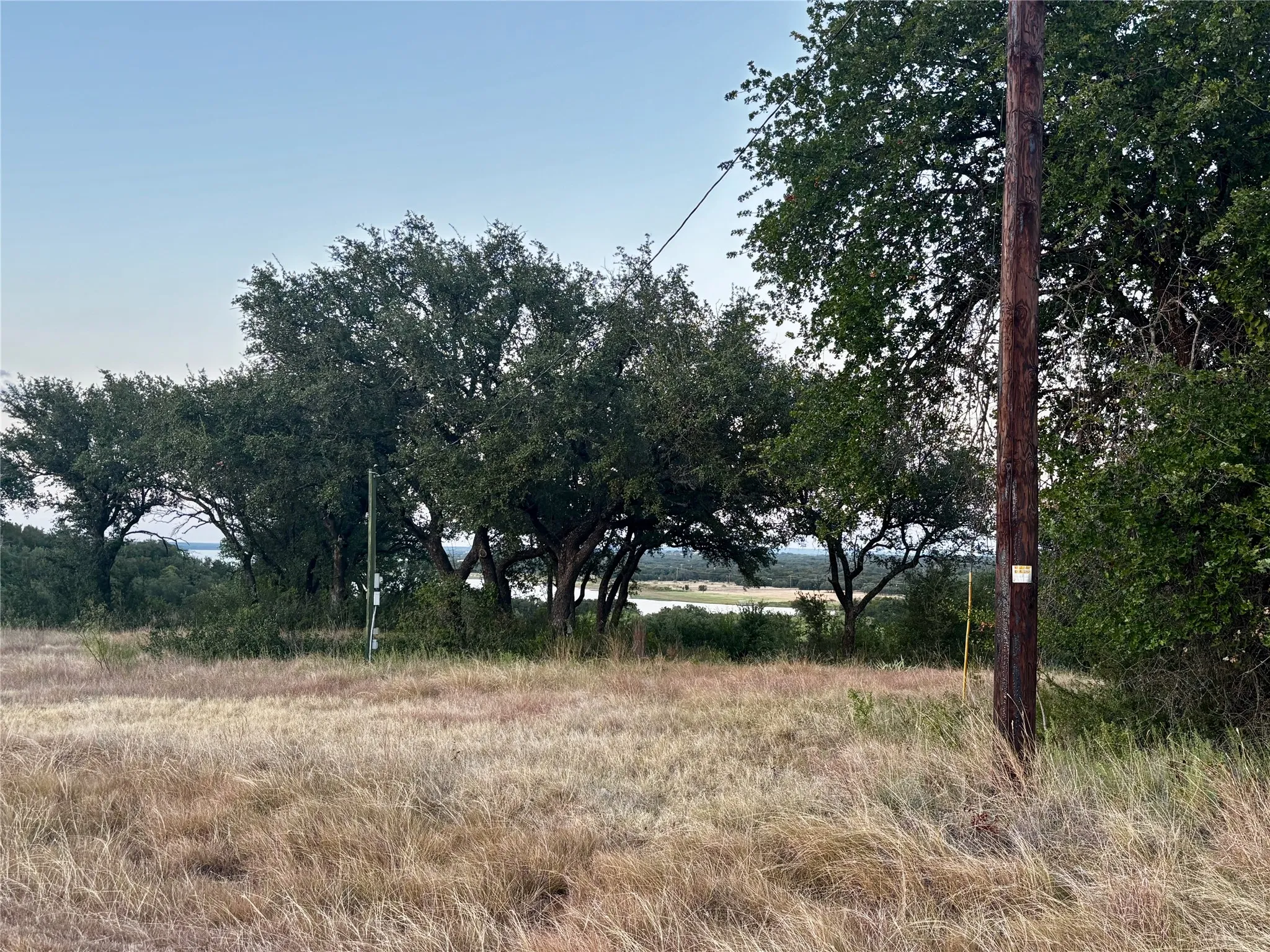 View across the street with lake Brownwood in the distance.