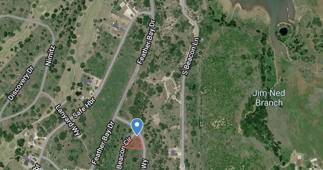 Aerial Map. Highlighting the property's location relative to named roads and a body of water