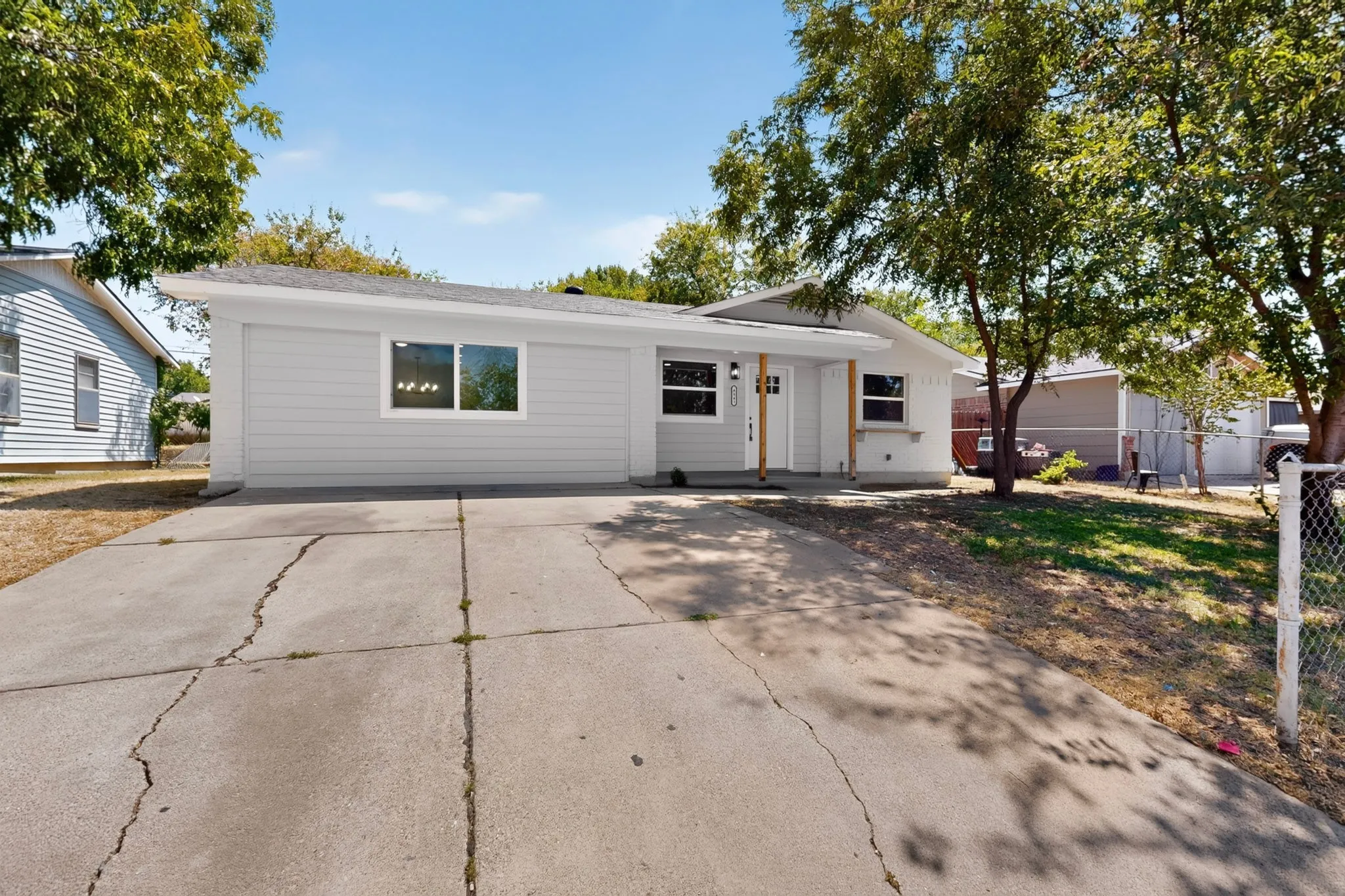 Light gray siding exterior with white trim