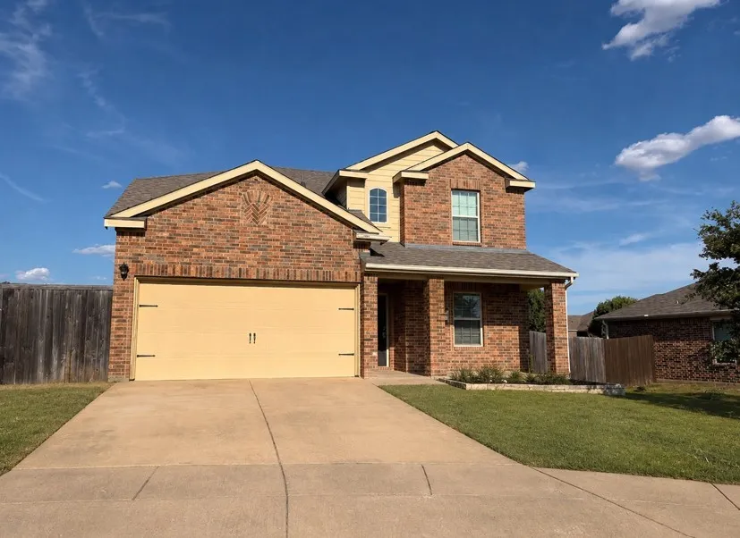Brick exterior with complementary siding accents