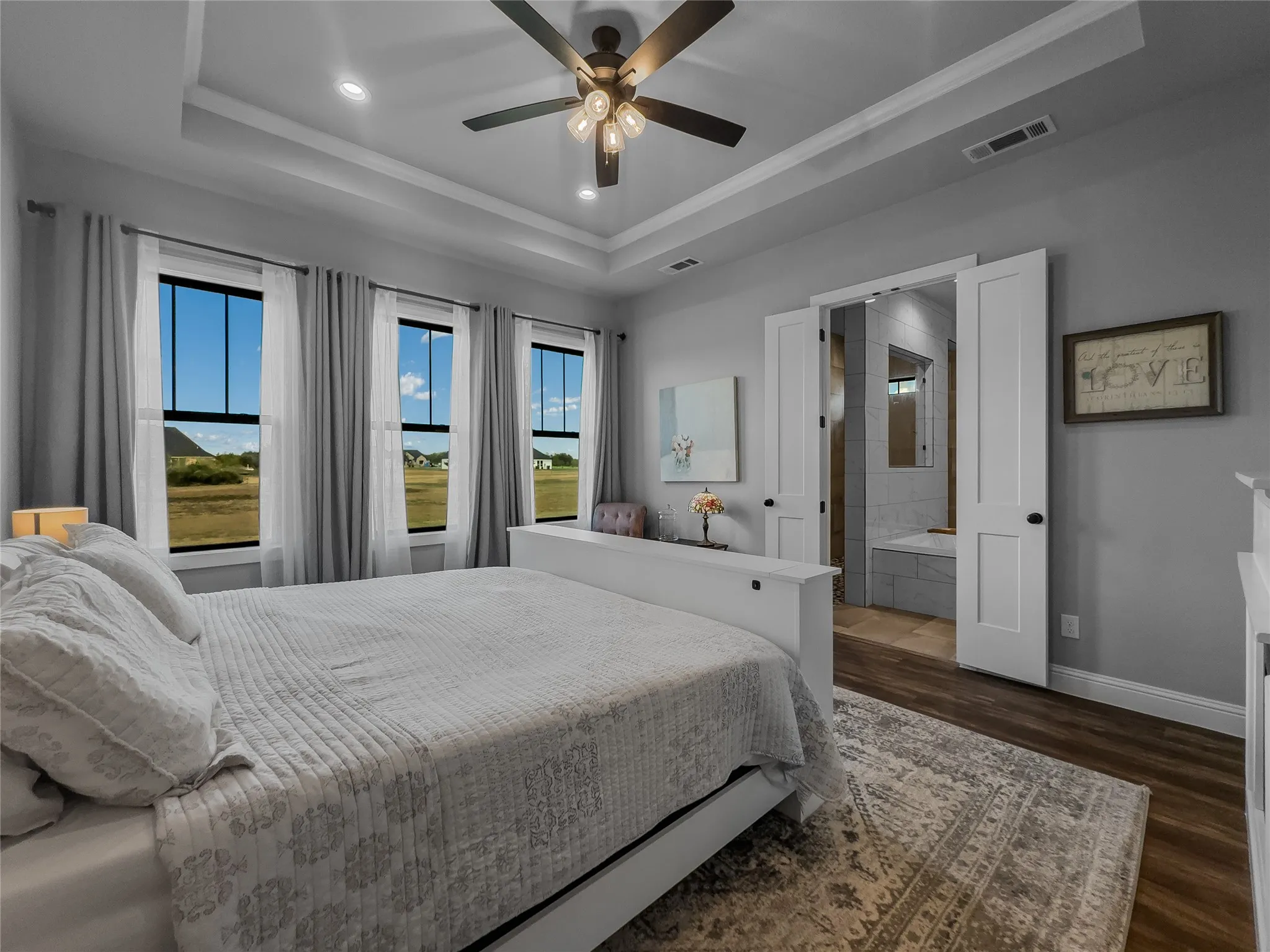 Master bedroom looks over backyard
